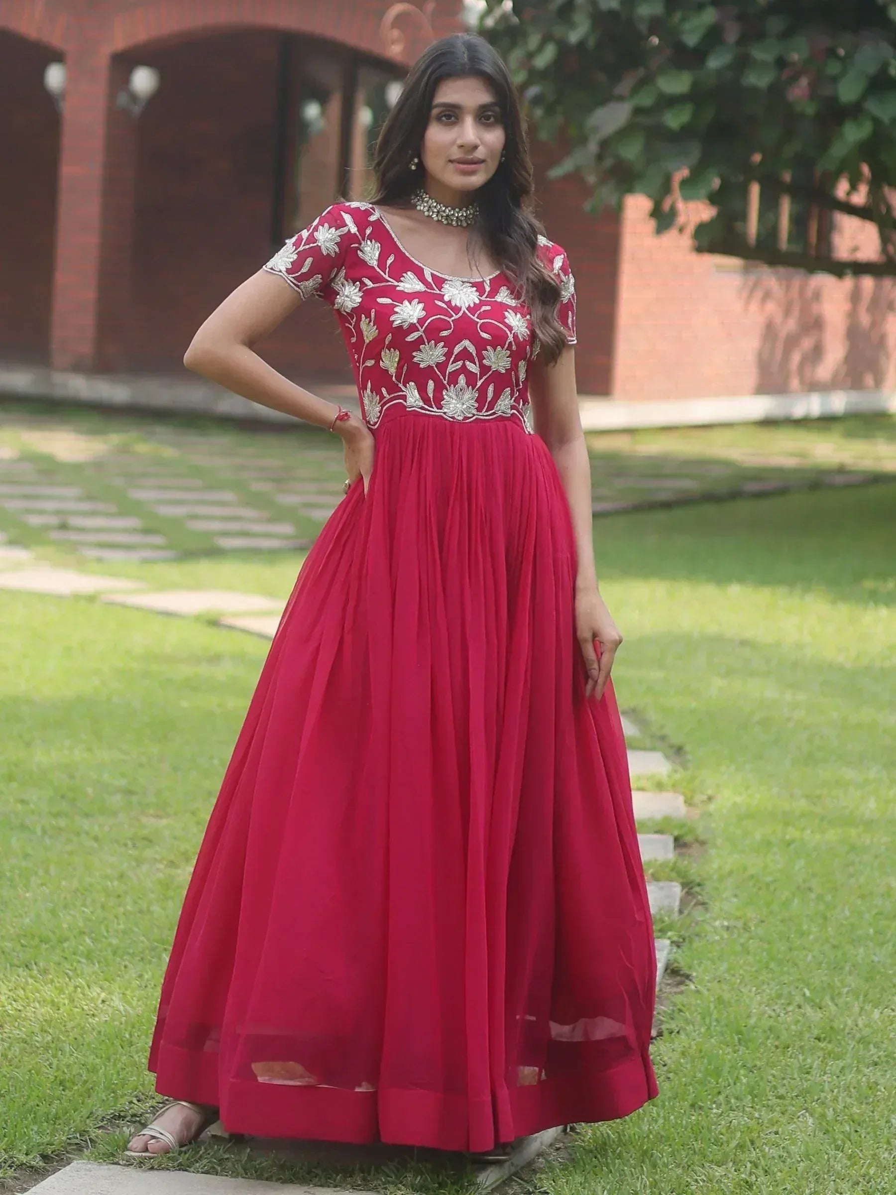 Red ethnic gown with silver floral embroidery, perfect for Indian occasions and parties
