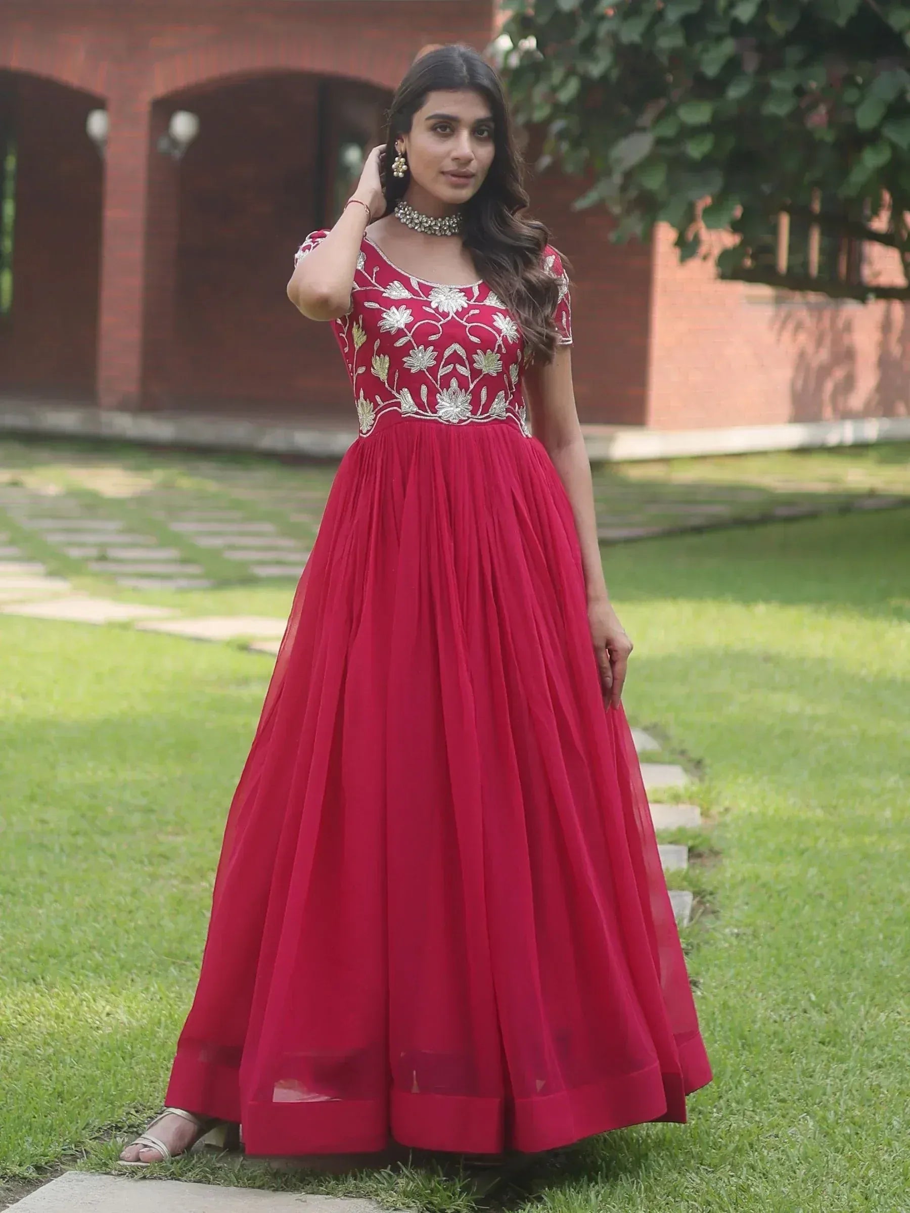 Red embroidered ethnic gown with floral detailing, perfect for Indian weddings and parties