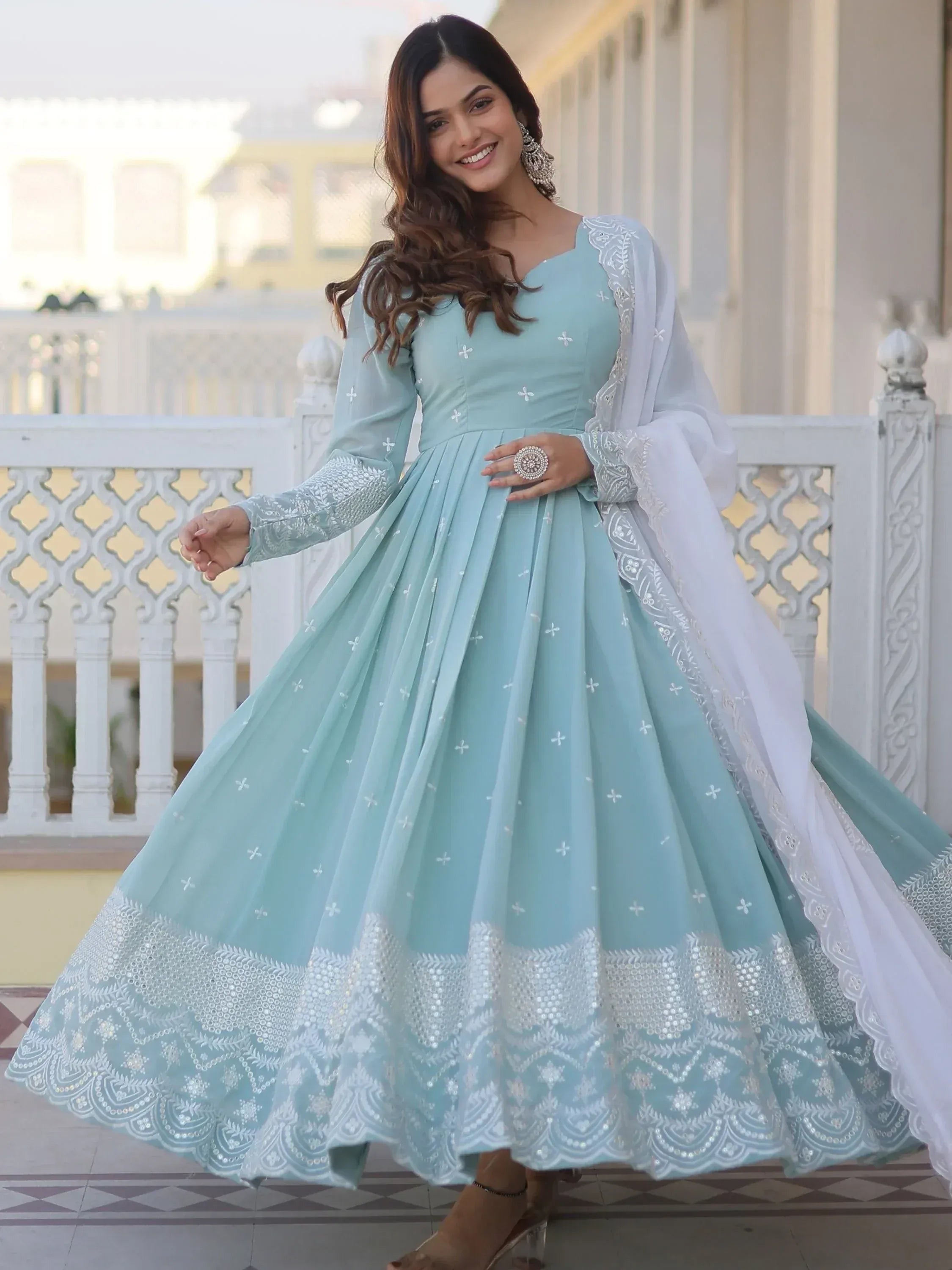 Light blue embroidered anarkali with white dupatta, perfect for Indian ethnic occasions and festive wear.