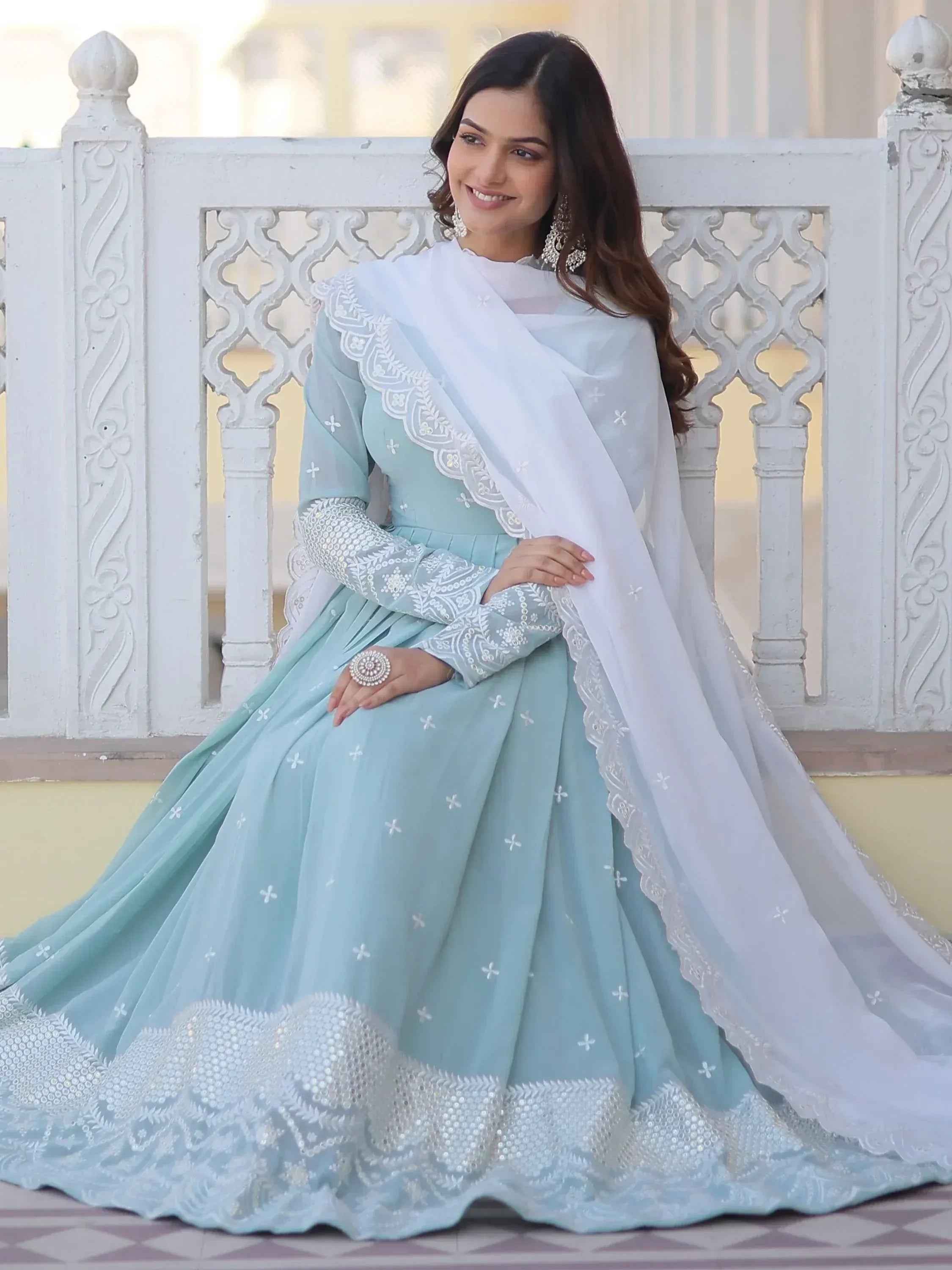 Light blue embroidered lehenga choli with white dupatta, perfect for Indian ethnic occasions