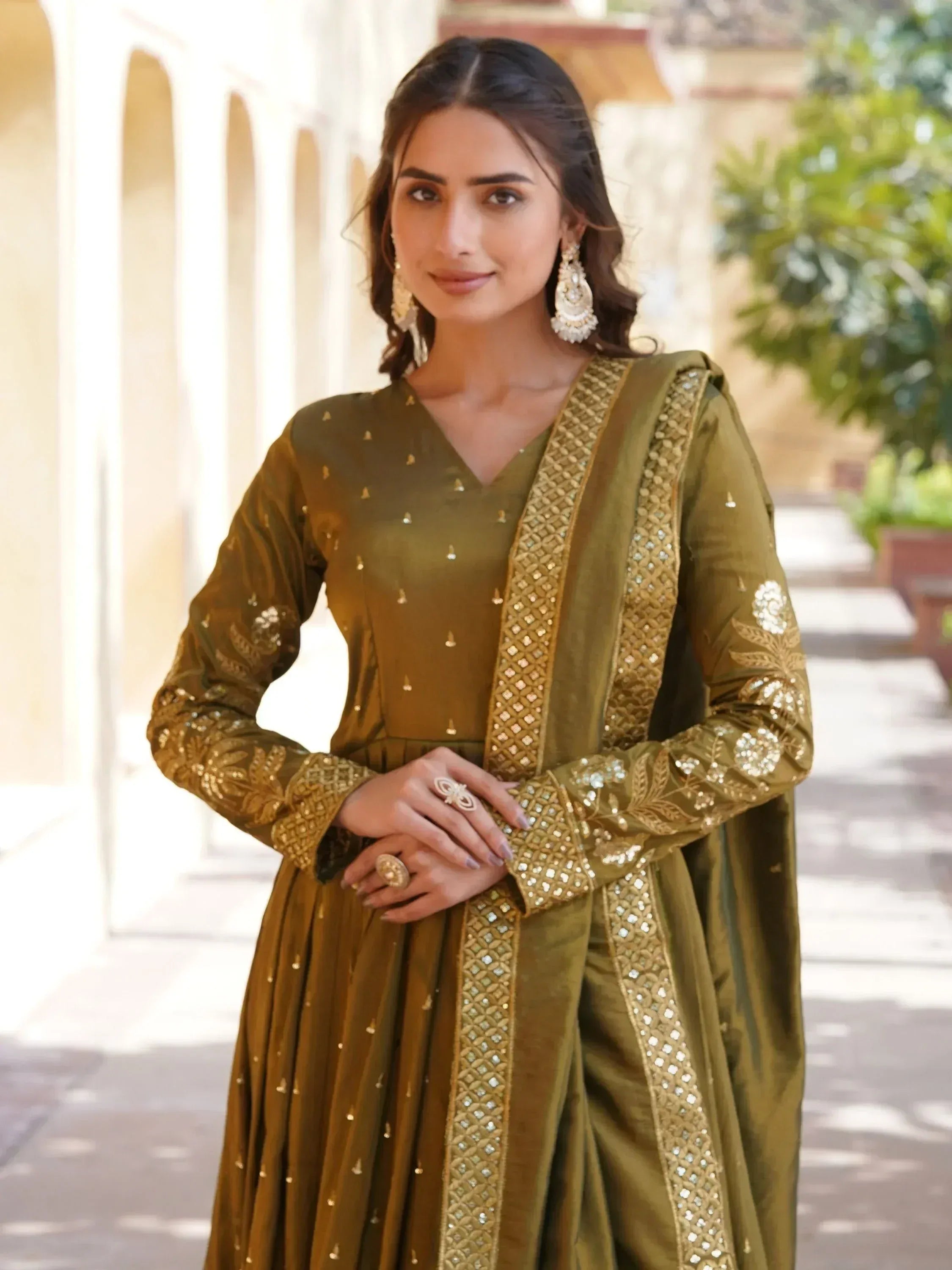 Olive green embroidered salwar kameez with gold detailing, perfect for Indian ethnic occasions