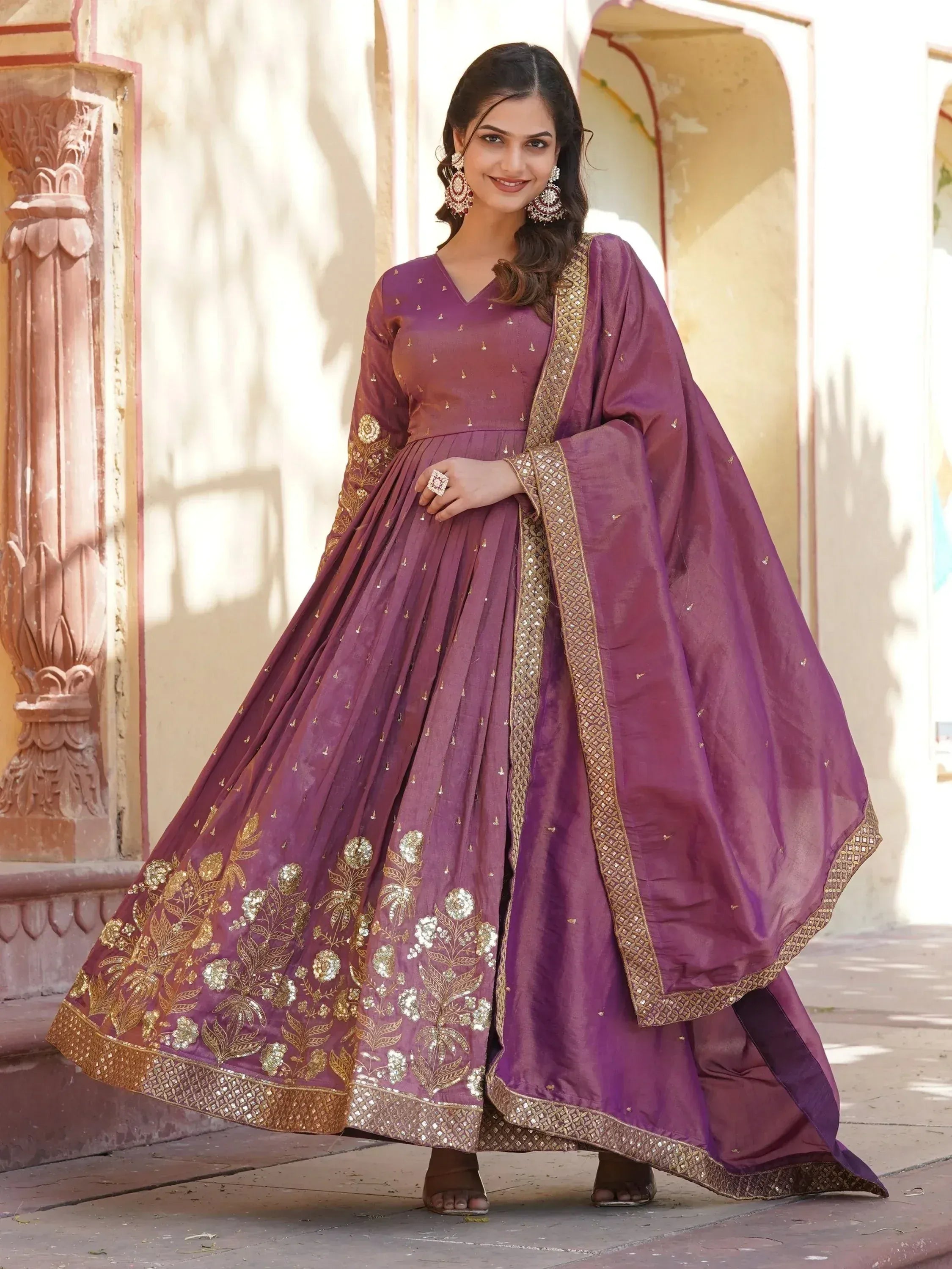 Purple Indian anarkali suit with gold embroidery, perfect for weddings and festive occasions