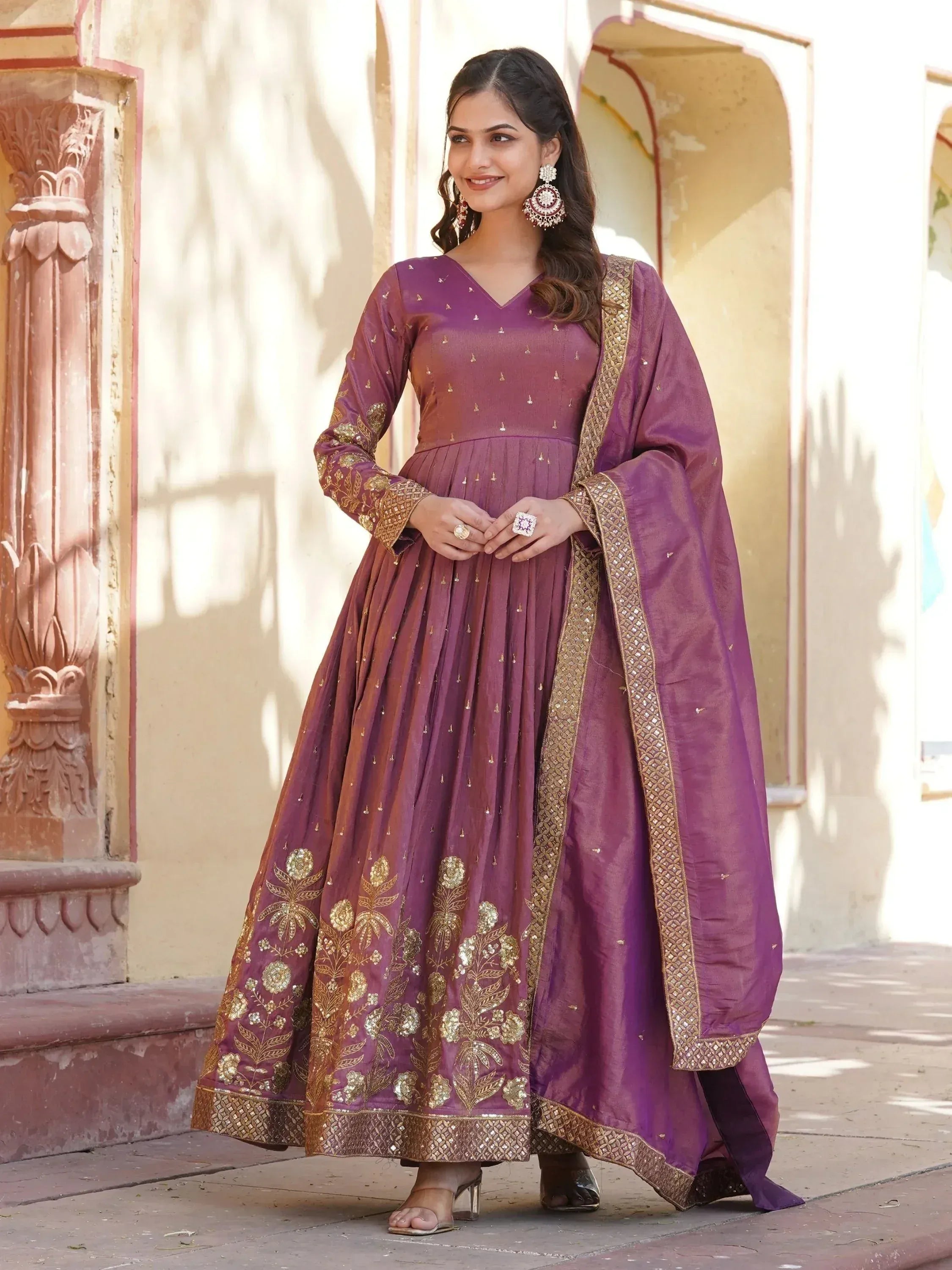 Purple Indian ethnic anarkali suit with gold embroidery, perfect for weddings and festive occasions