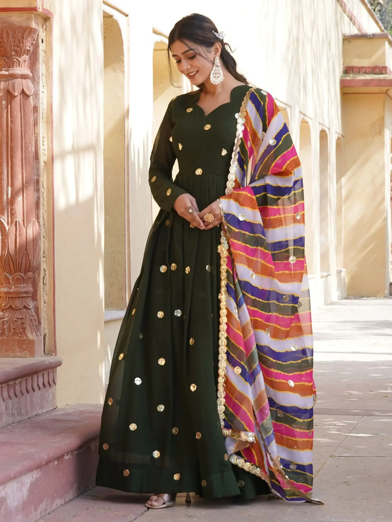 Spectacular Green Sequins Georgette Mehendi Wear Gown With Dupatta