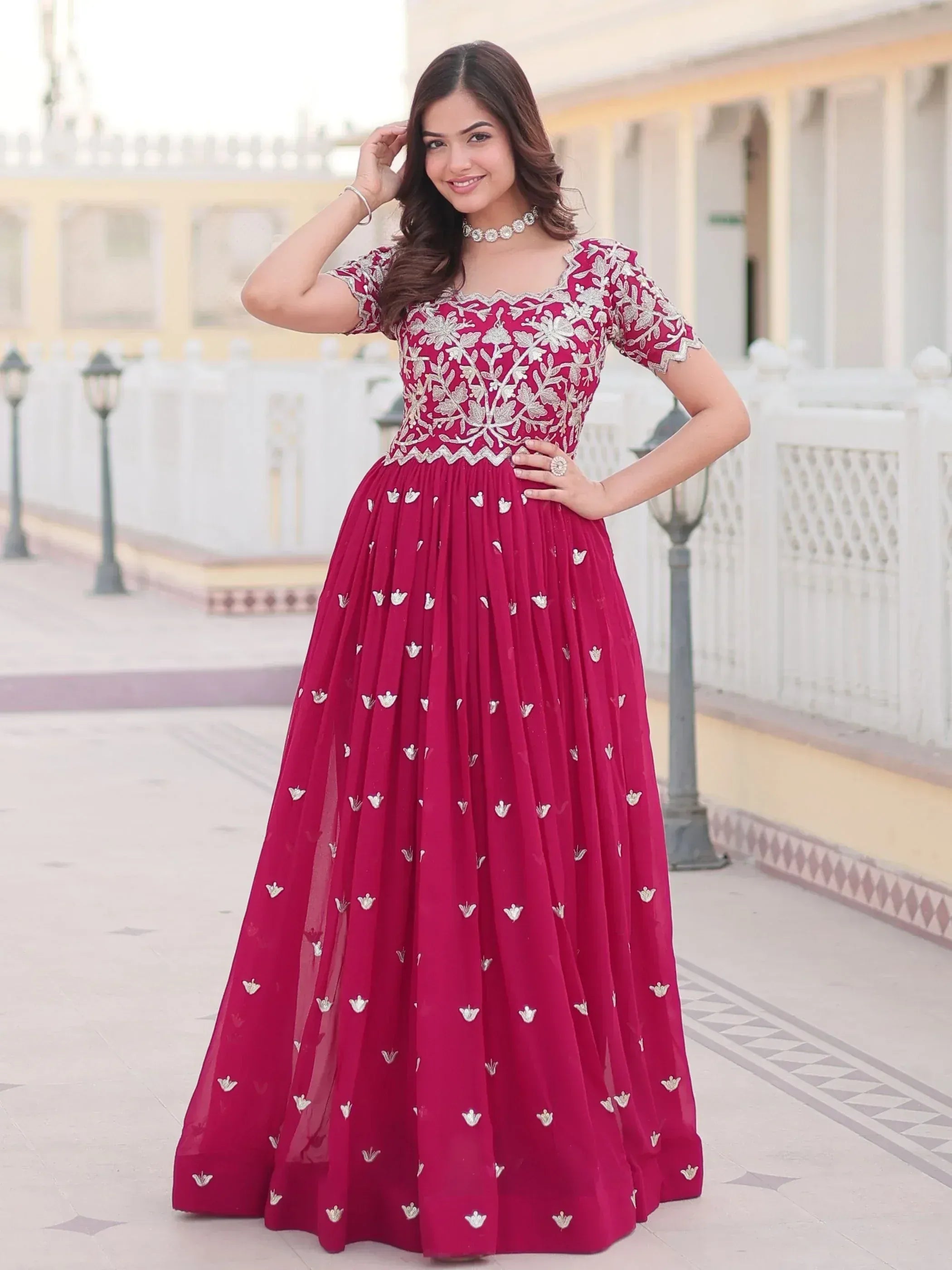 Burgundy ethnic gown with silver floral embroidery, perfect for Indian weddings and festive occasions