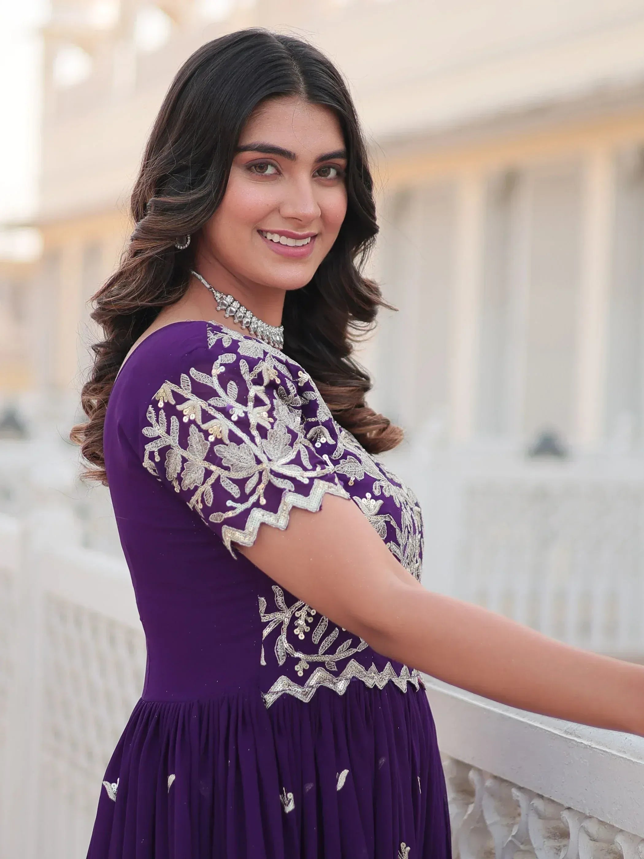 Purple ethnic gown with silver embroidery, perfect for Indian occasions and festive wear.