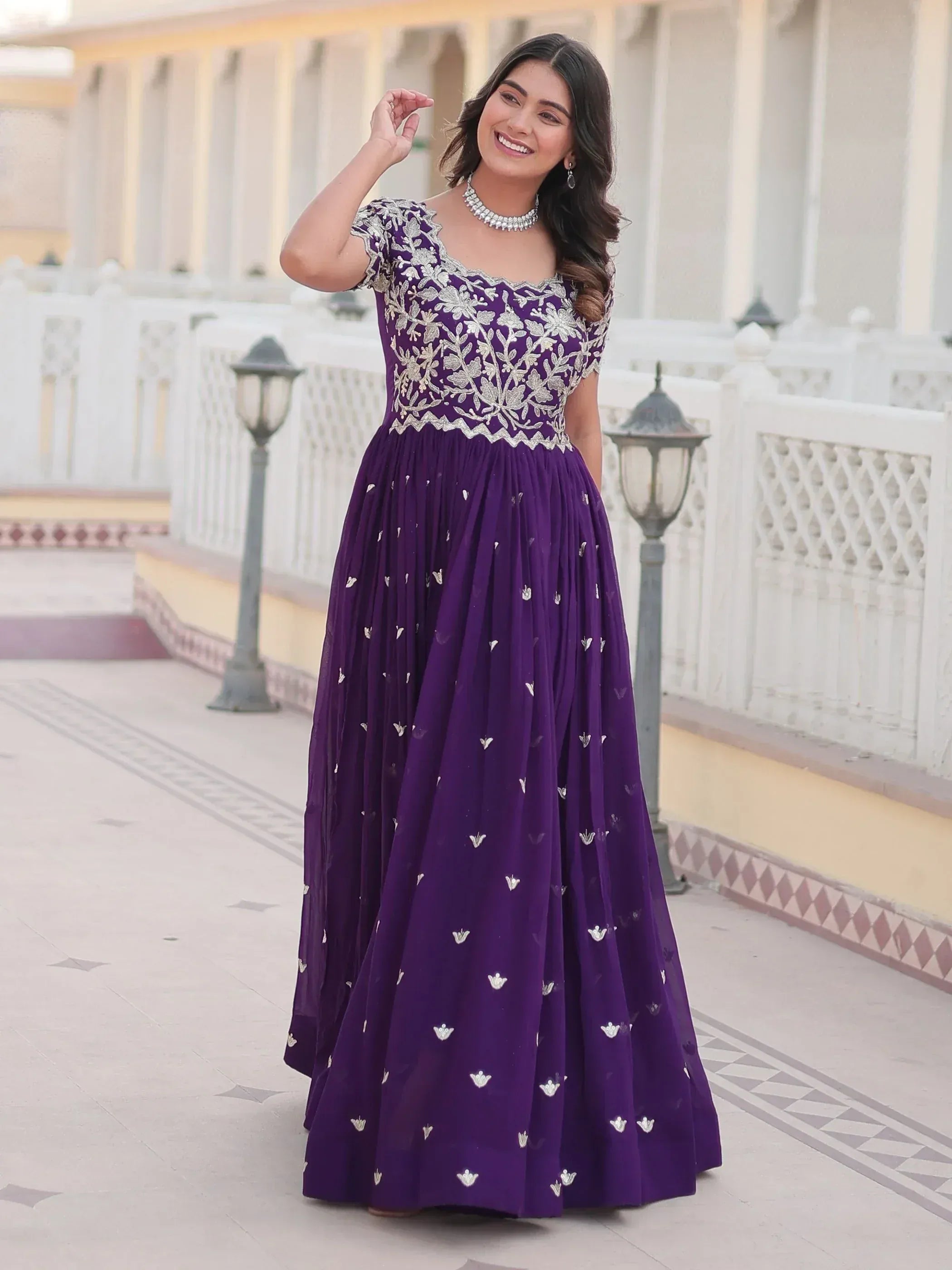 Purple ethnic gown with silver floral embroidery, perfect for Indian weddings and festive occasions