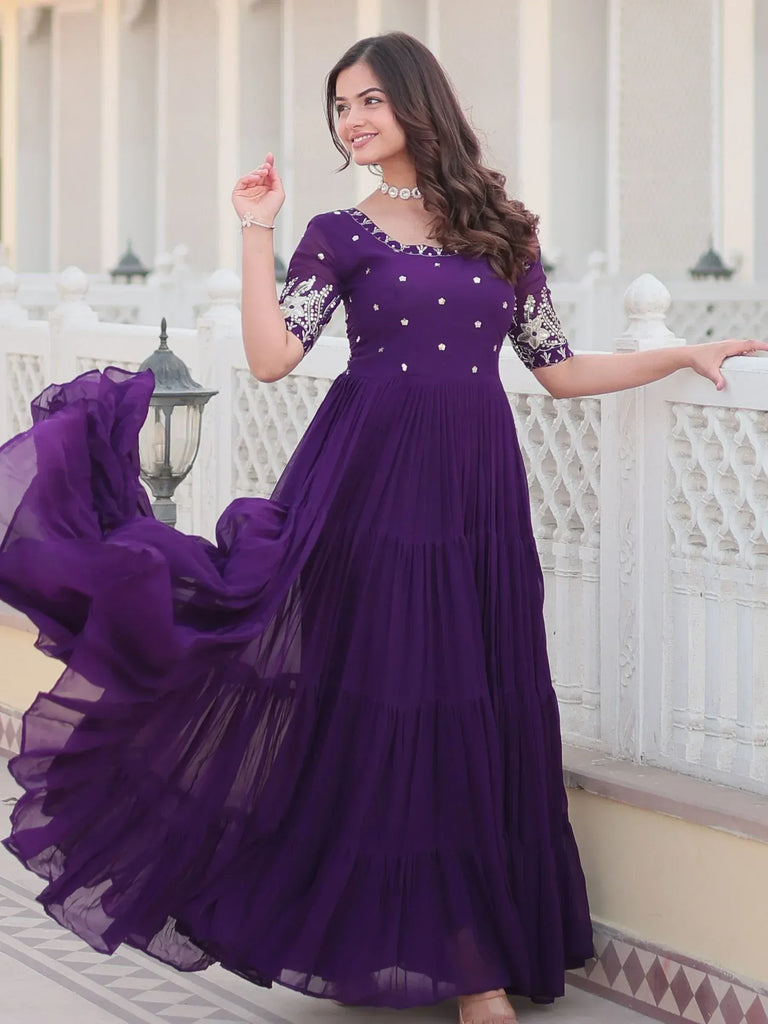 Purple ethnic gown with floral embroidery, pleated skirt, perfect for Indian occasions