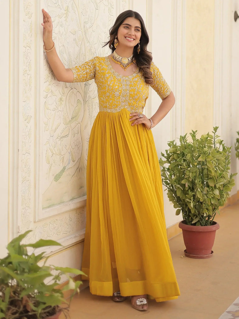 Glamorous Yellow Embroidered Georgette Haldi Wear Gown
