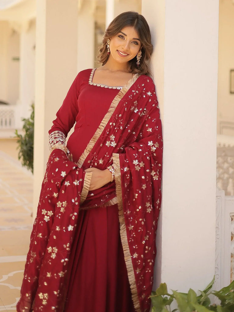 Outstanding Maroon Sequins Silk Festival Wear Gown With Dupatta