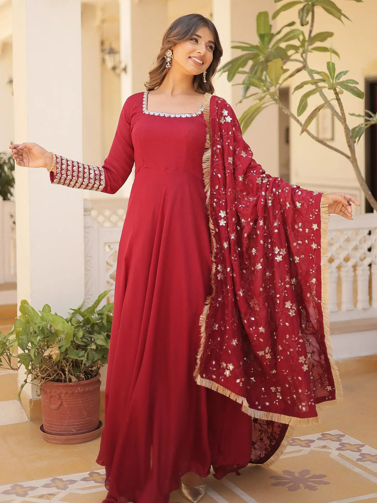 Outstanding Maroon Sequins Silk Festival Wear Gown With Dupatta