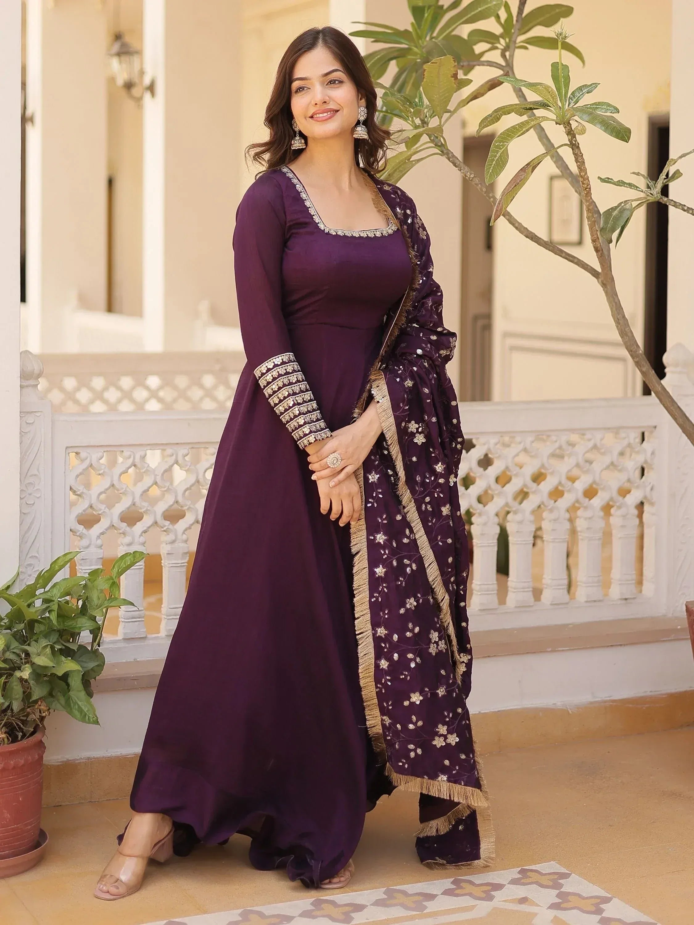 Purple embroidered anarkali suit with gold detailing, perfect for Indian ethnic occasions