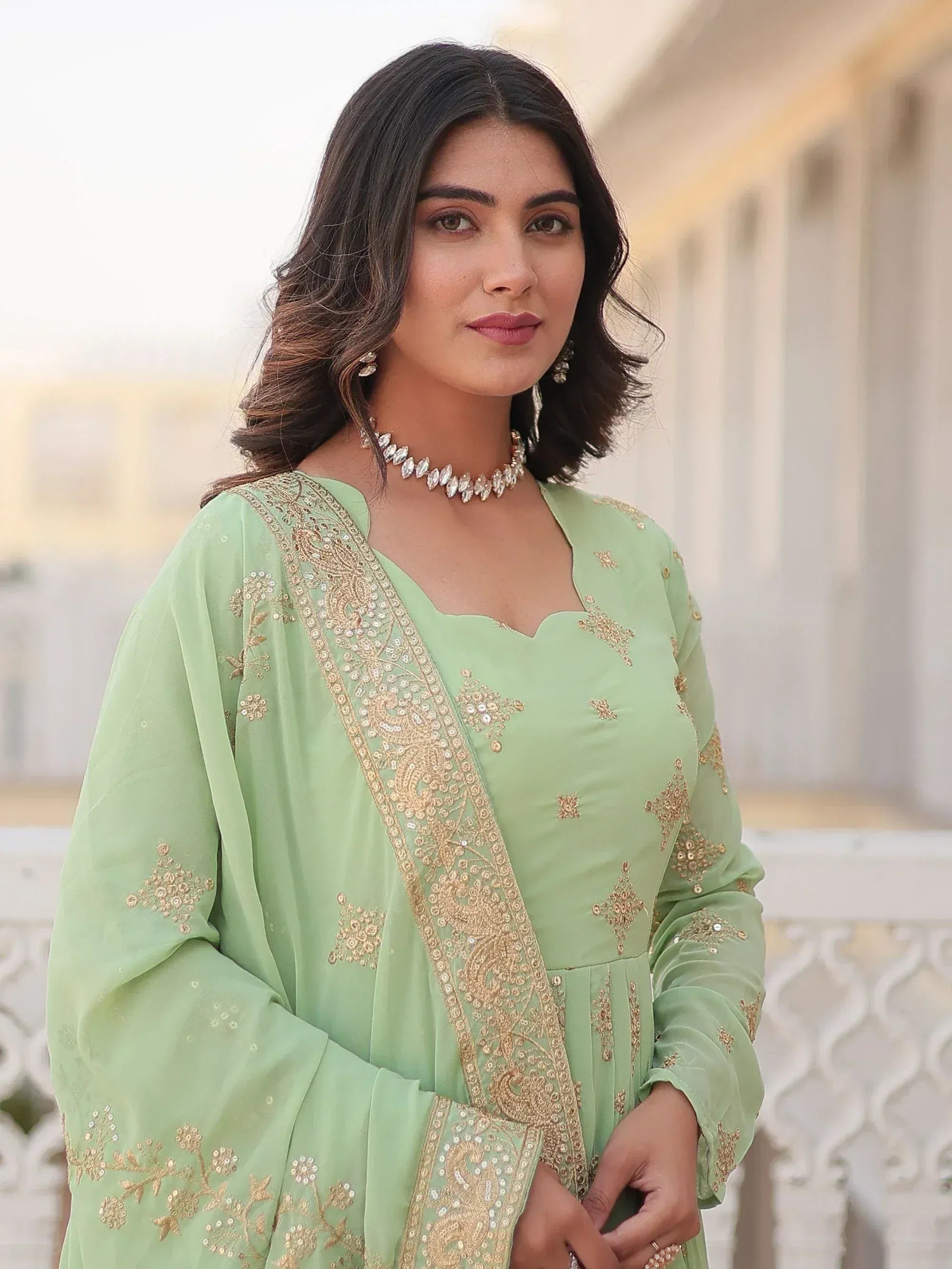 Mint green embroidered salwar kameez with gold detailing, perfect for Indian ethnic wear occasions