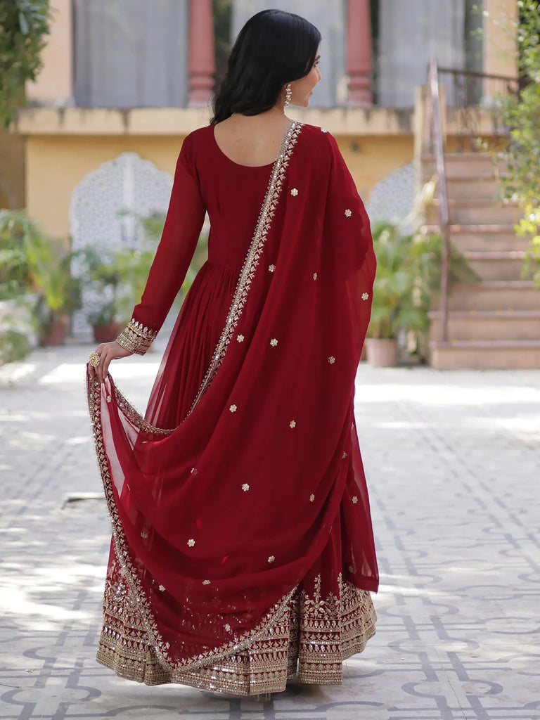 Wonderful Maroon Zari Embroidered Georgette Wedding Wear Gown