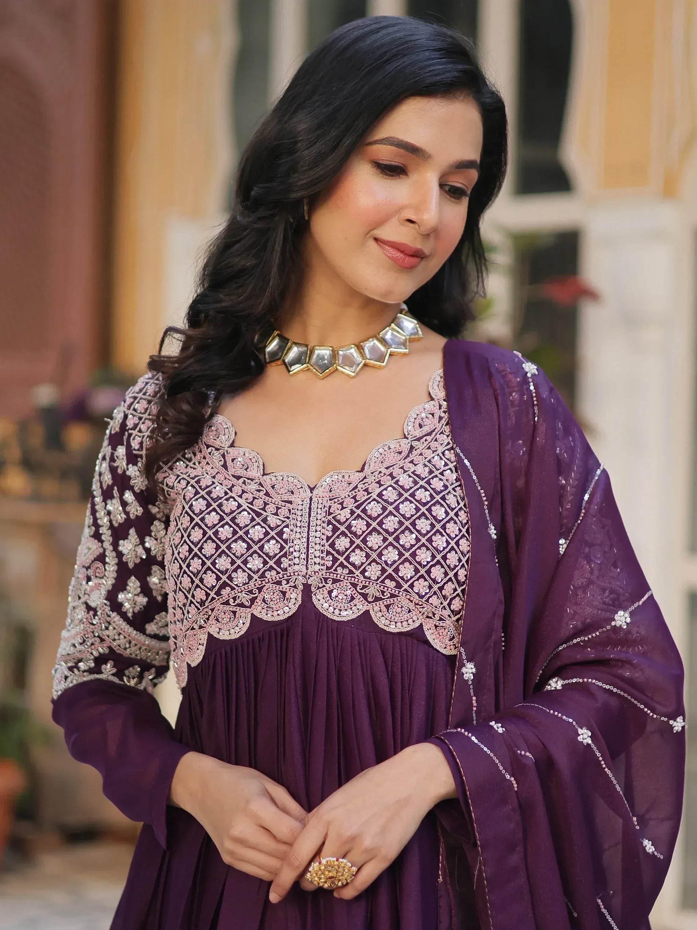 Purple embroidered ethnic gown with scalloped neckline and matching dupatta, perfect for Indian occasions