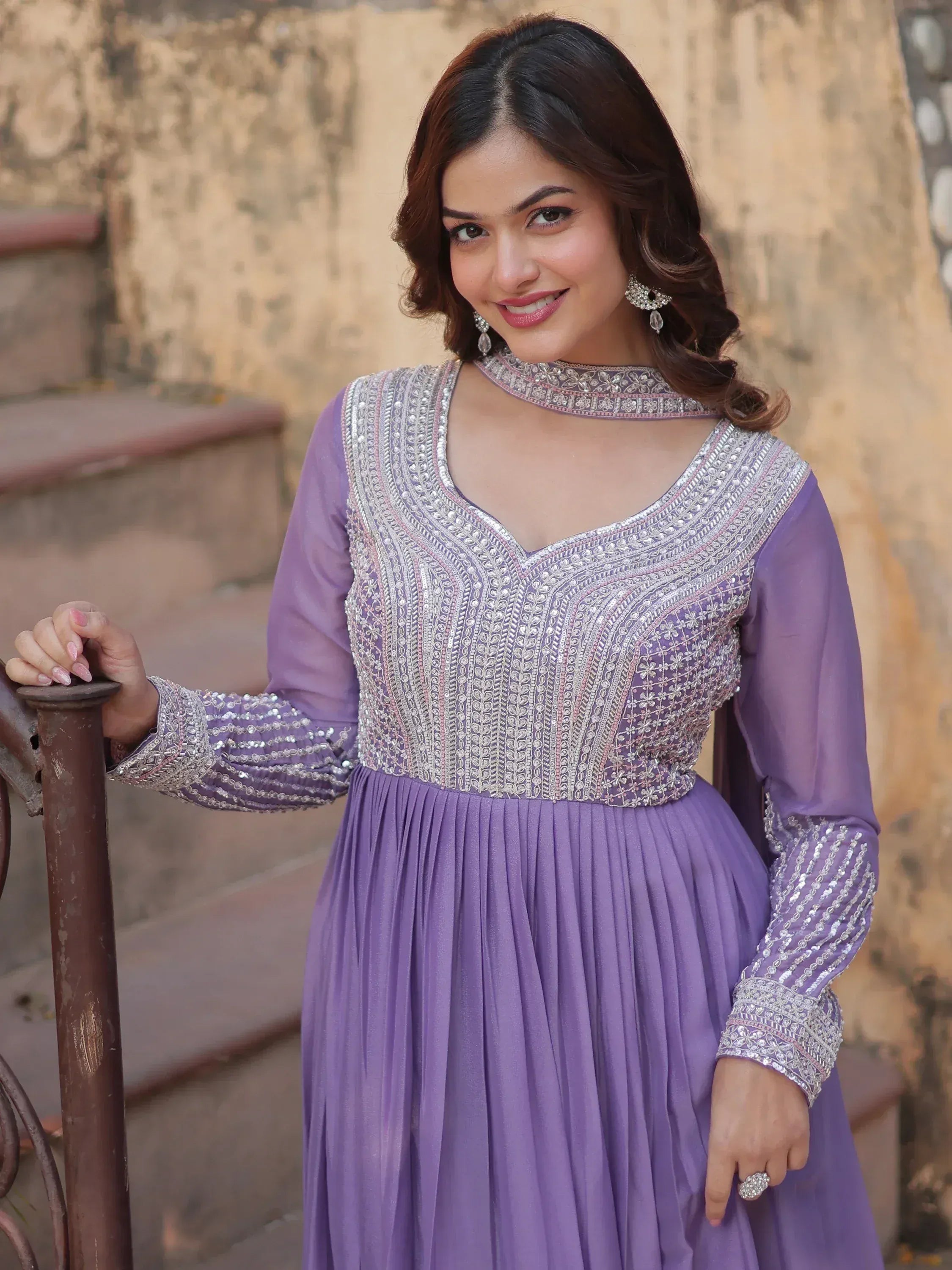 Lavender ethnic gown with silver embroidery, perfect for Indian occasions and festive wear.