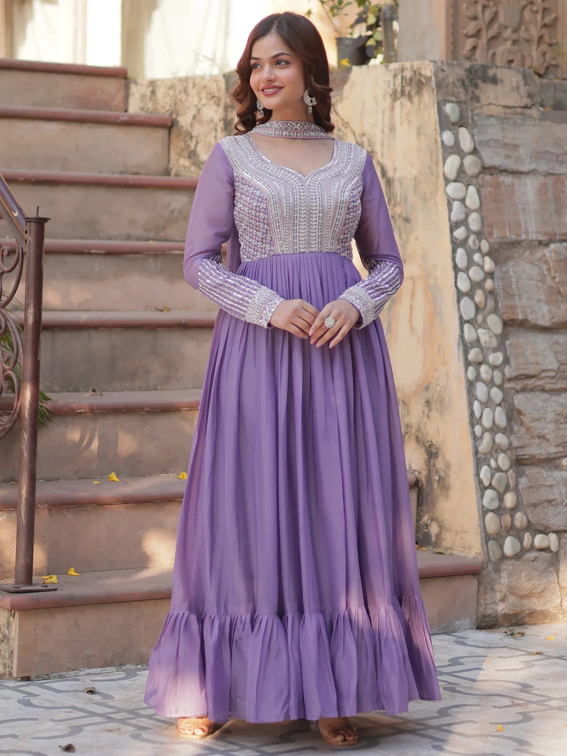 Purple embroidered anarkali gown with silver detailing, perfect for Indian ethnic occasions.