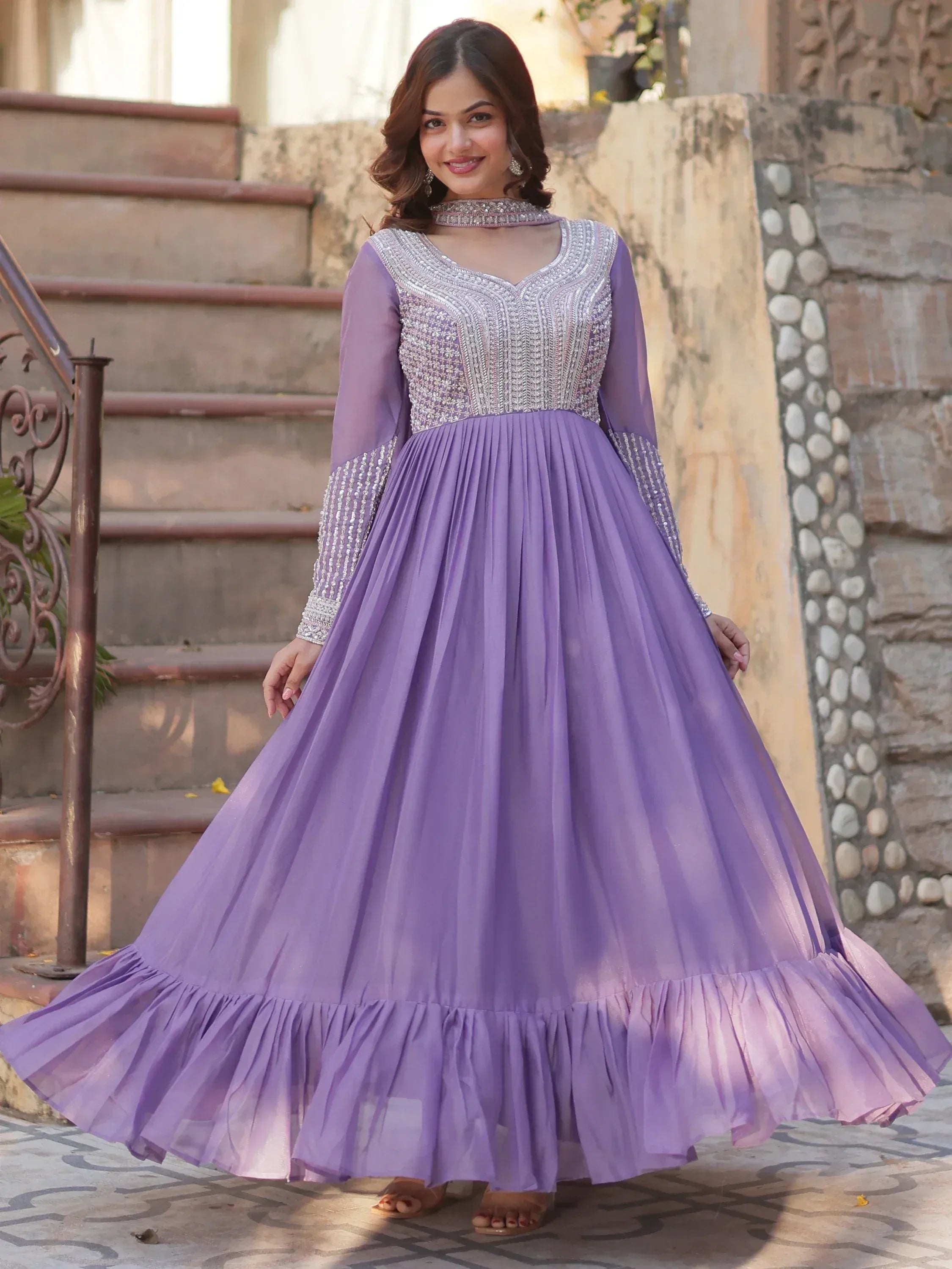 Purple ethnic gown with silver embroidery, perfect for Indian celebrations and events.