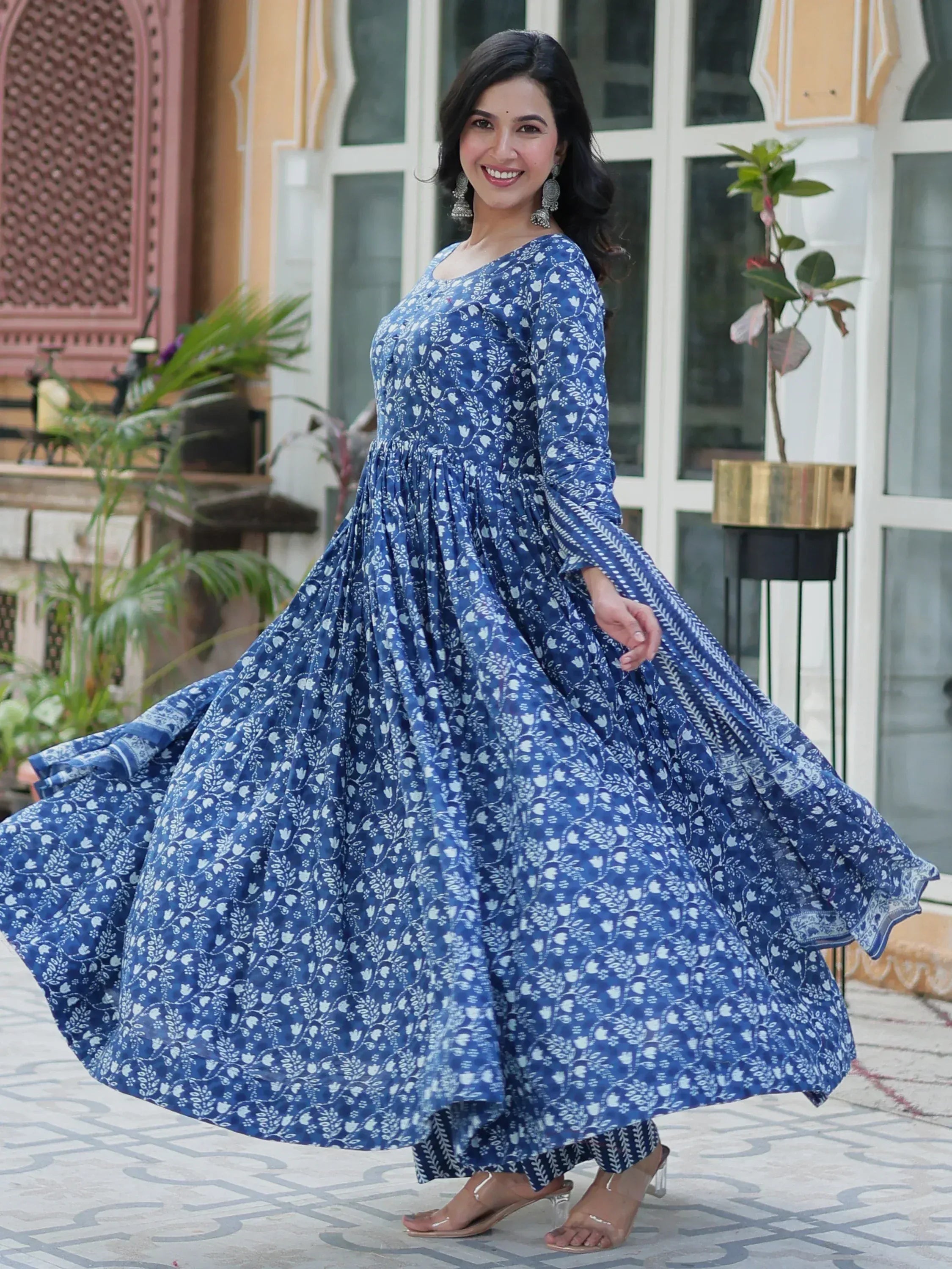 Blue floral ethnic gown with flowing skirt, perfect for Indian wear trends