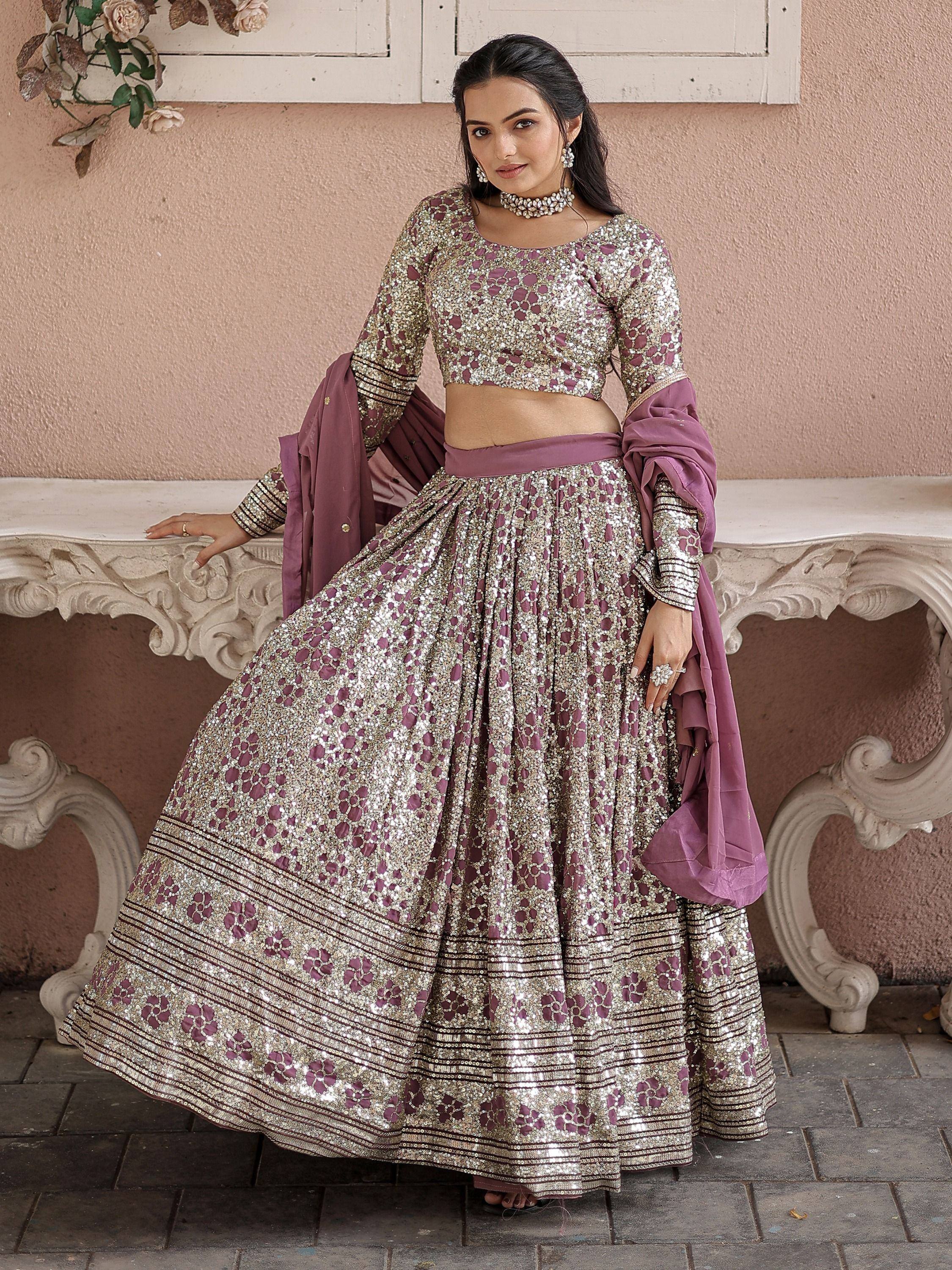Elegant mauve and gold sequin lehenga choli with matching dupatta, perfect for Indian weddings and festive occasions.