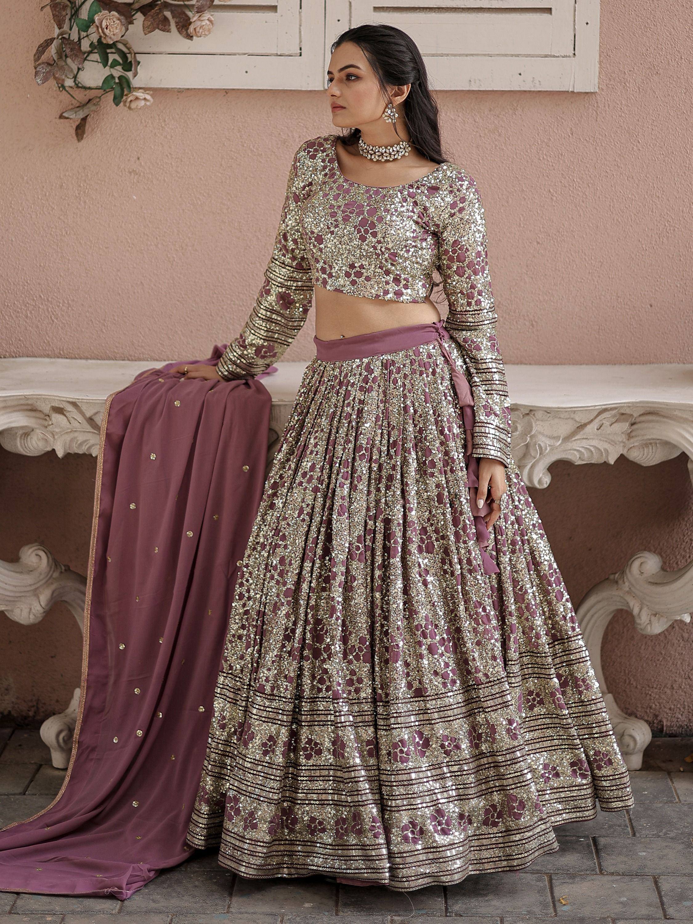 Elegant mauve and gold sequin lehenga choli with matching dupatta, perfect for Indian weddings and festive occasions.