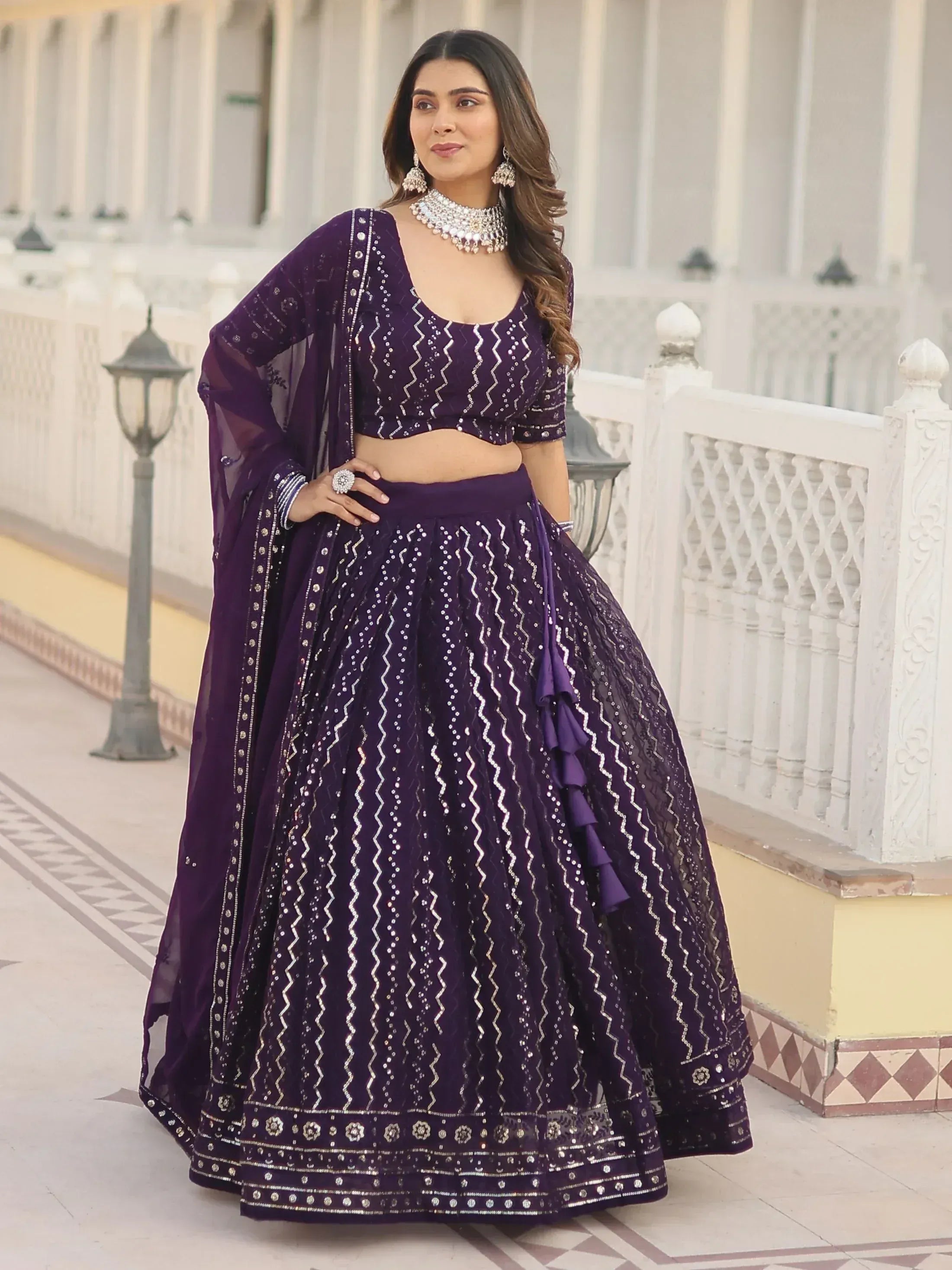 Purple designer lehenga choli with silver embroidery, perfect for Indian ethnic wear events