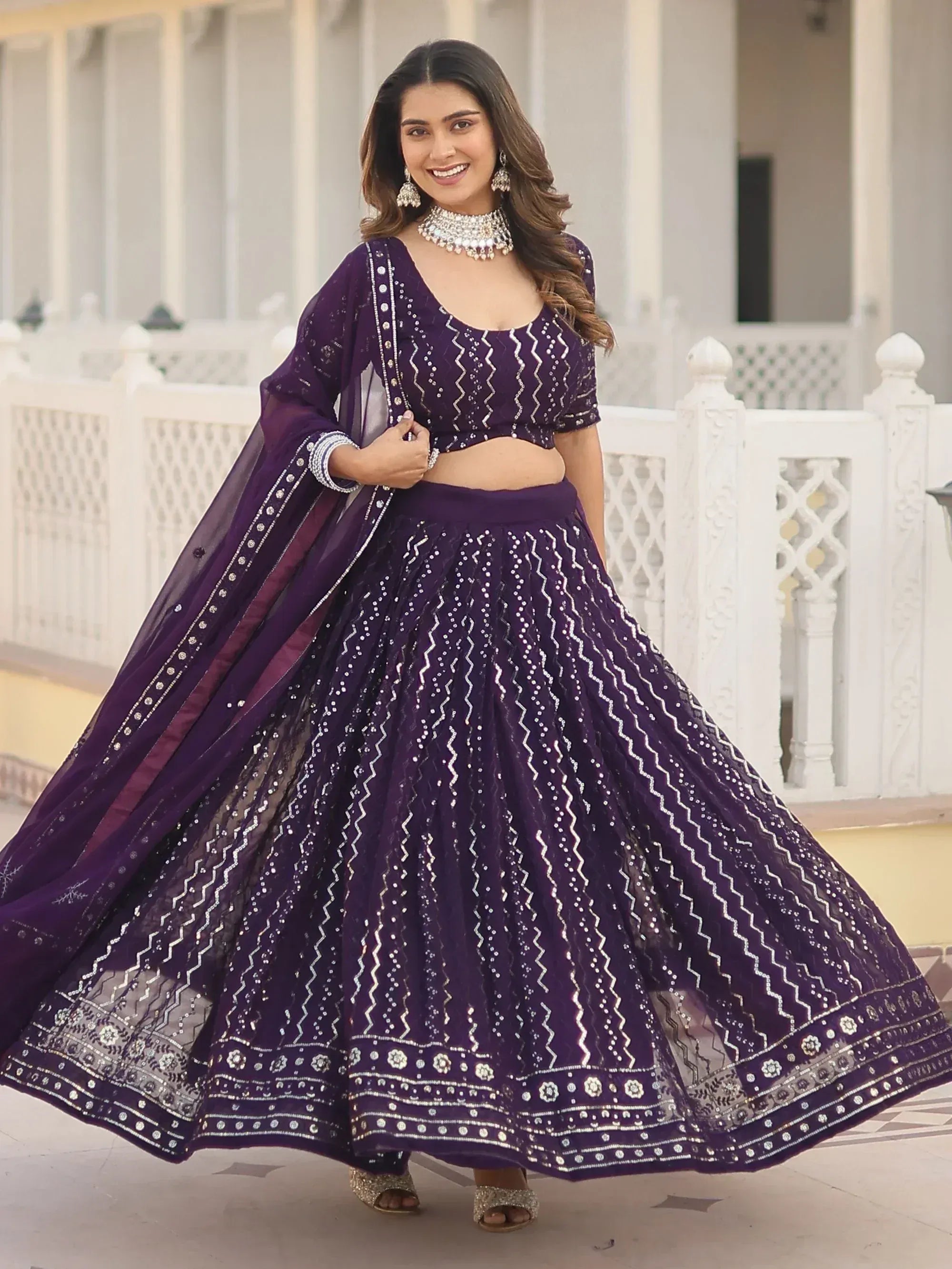 Purple designer lehenga choli with silver embroidery, perfect for Indian ethnic wear and festive occasions