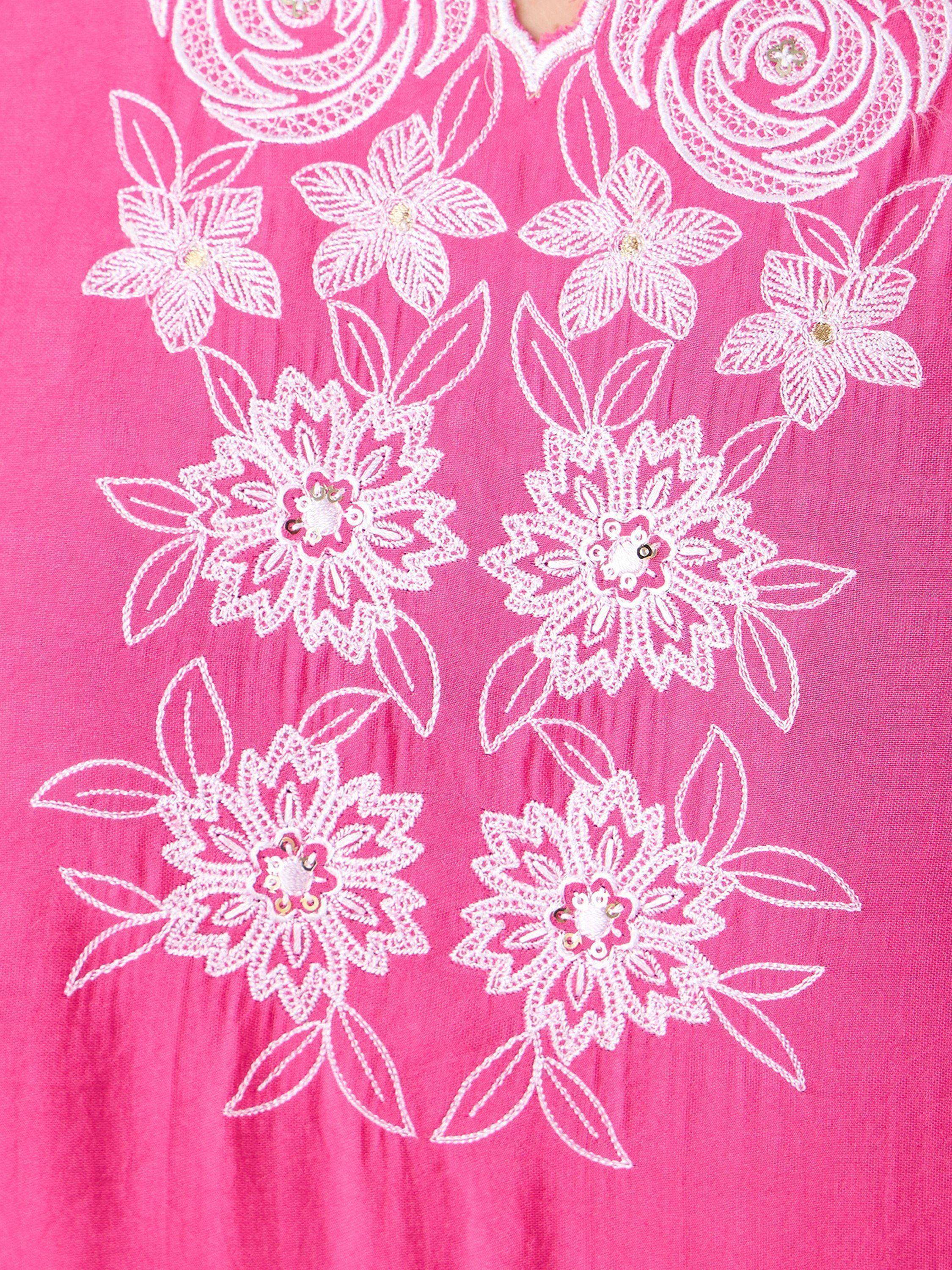 Pink ethnic kurti with white floral embroidery and sequin details