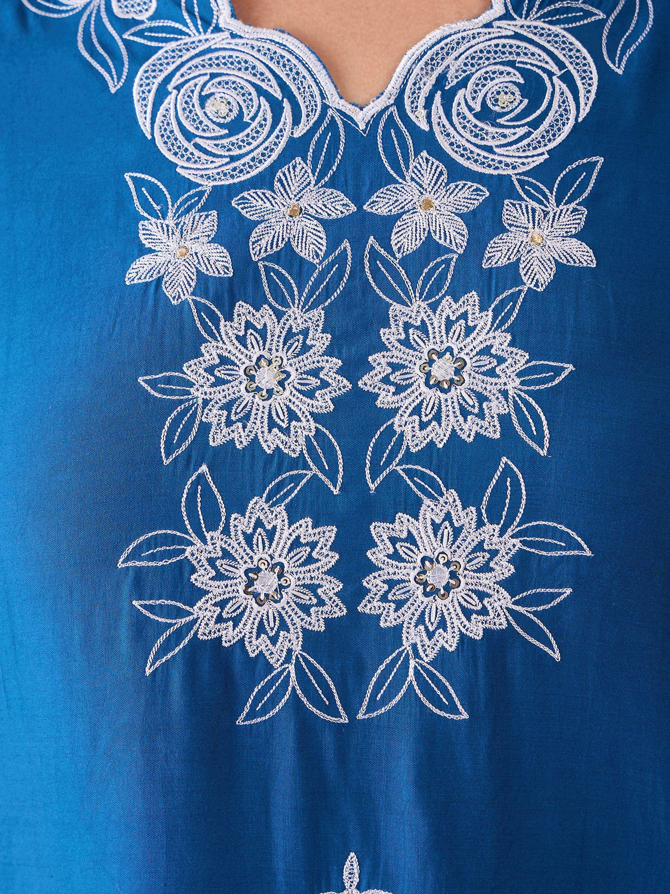 Blue ethnic kurta with white floral embroidery and sequin details, perfect for Indian wear