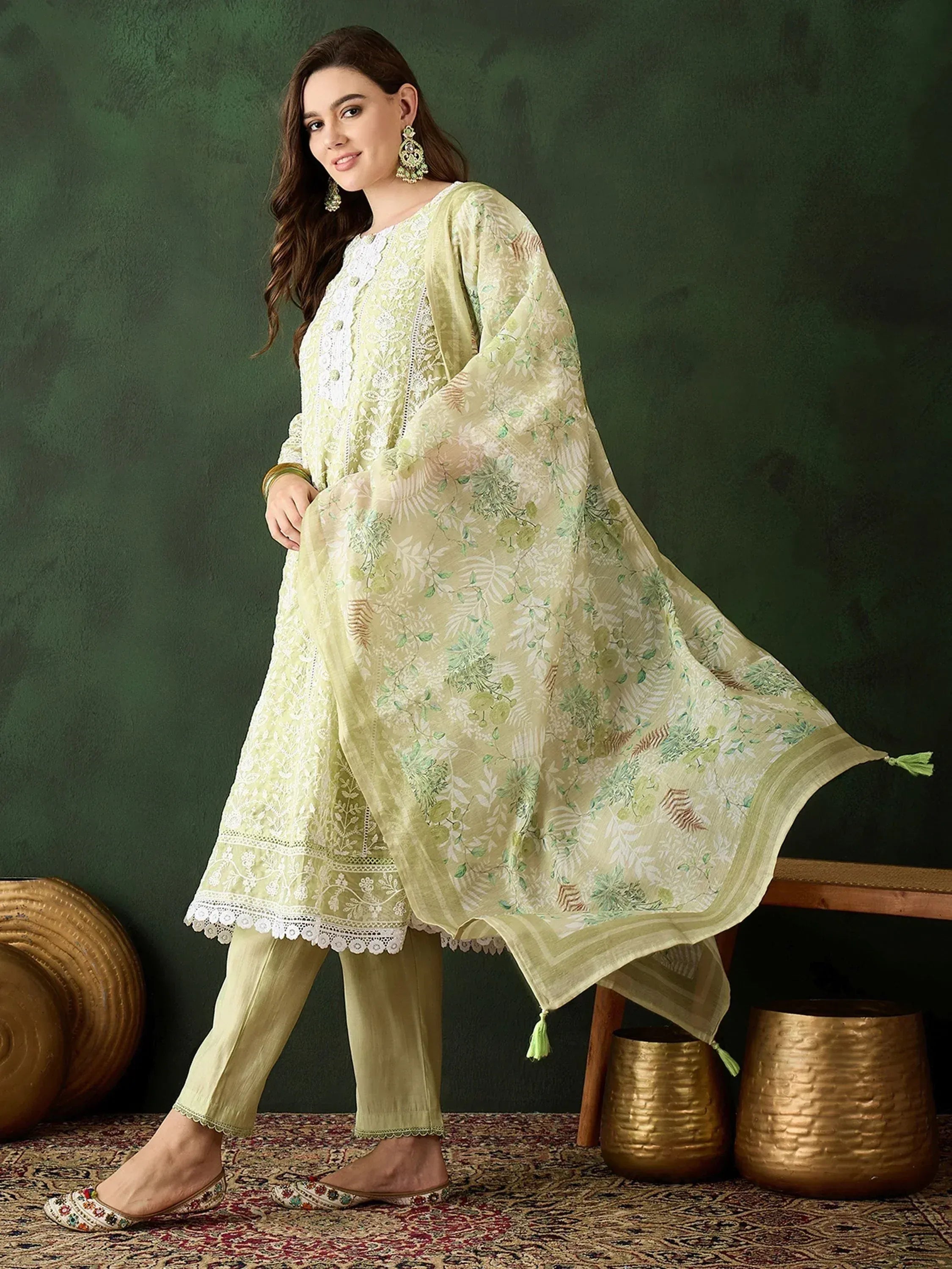 Light green embroidered salwar kameez with floral dupatta, perfect for ethnic occasions