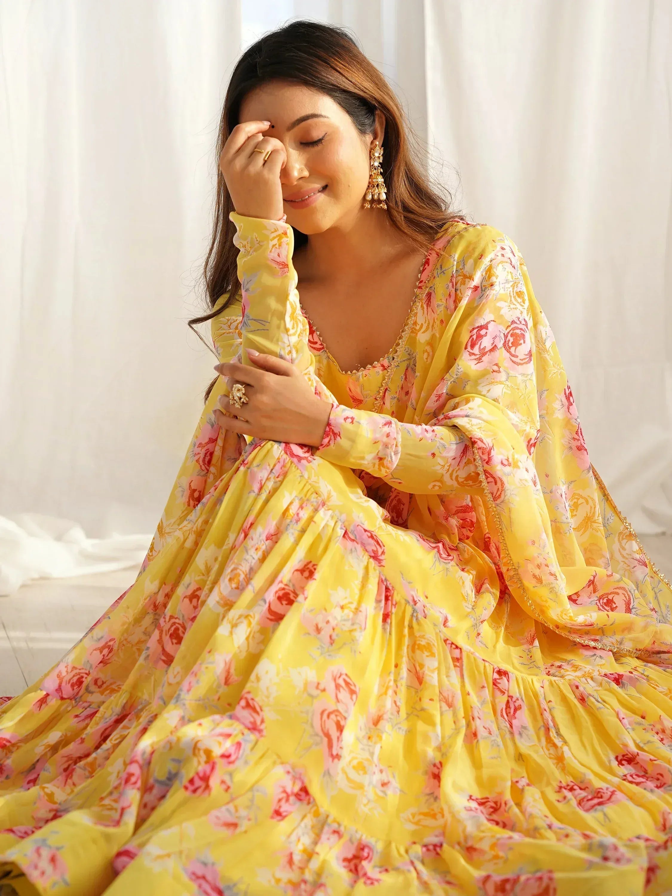 Yellow floral ethnic gown with long sleeves, perfect for Indian occasions and festive wear