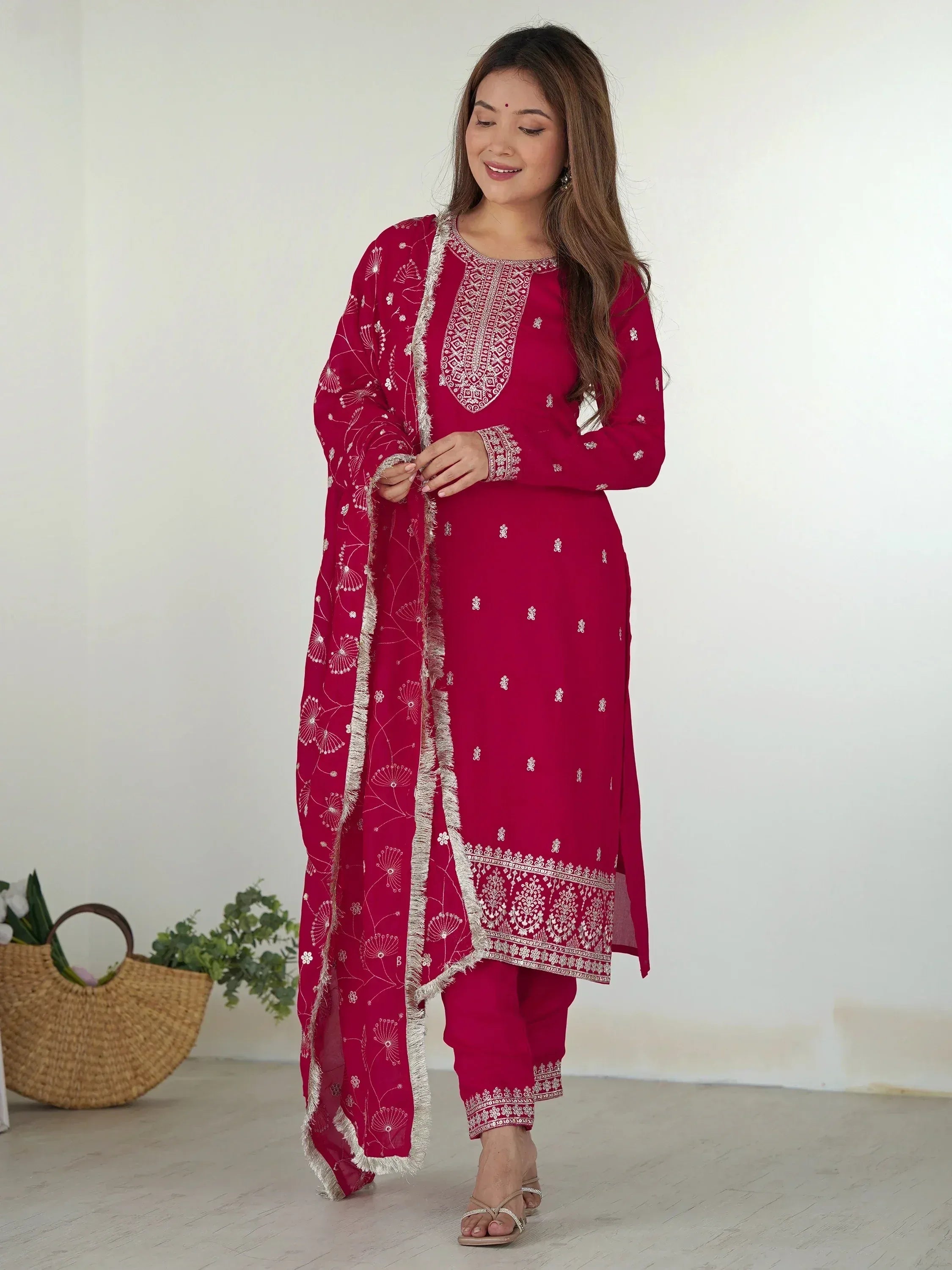 Woman in maroon embroidered salwar kameez with matching dupatta, Indian ethnic wear