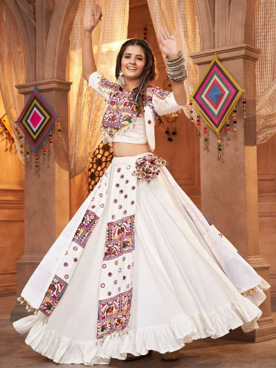 White embroidered lehenga choli with colorful mirror work, perfect for Indian ethnic wear and festive occasions
