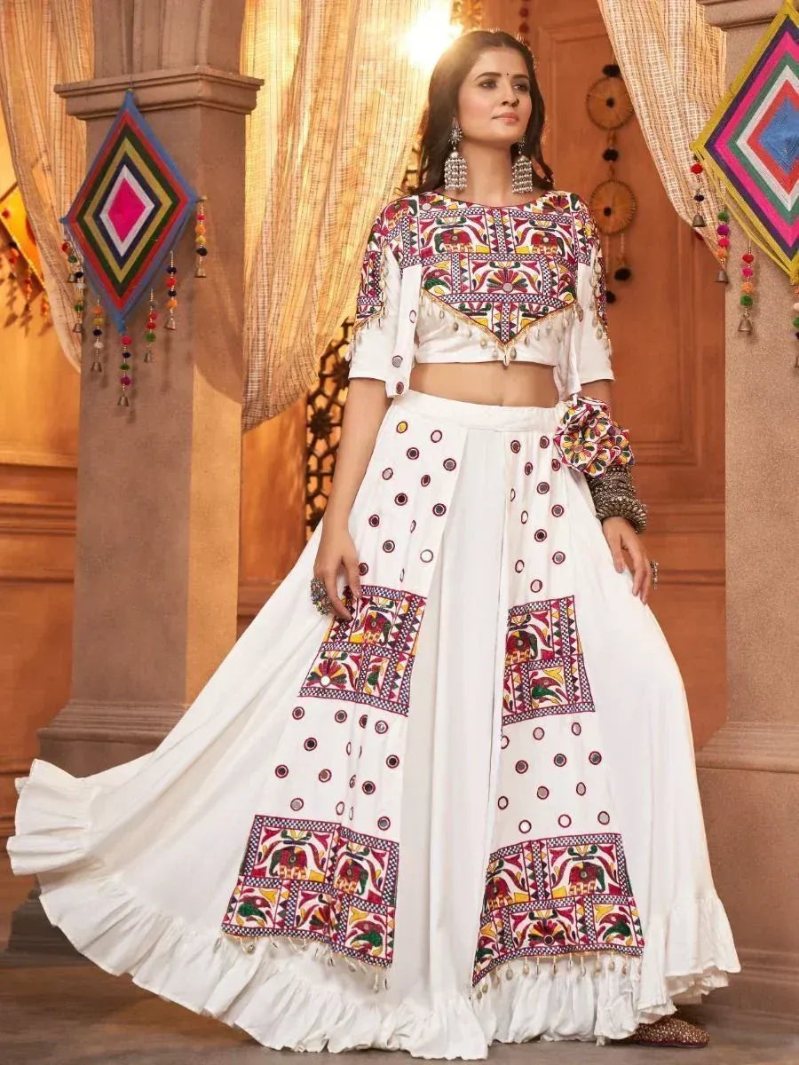 White embroidered lehenga choli with colorful patchwork, perfect for Indian ethnic occasions