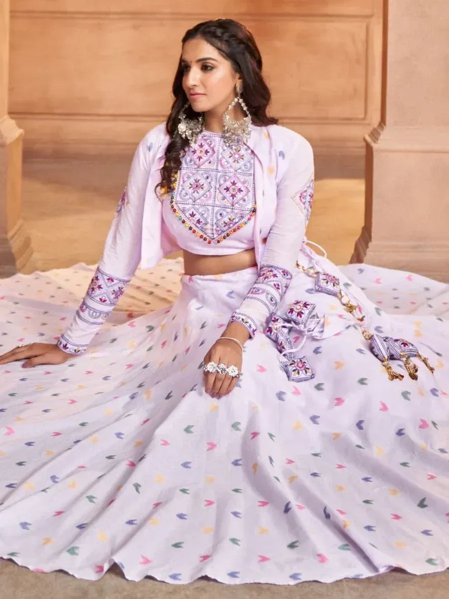 Elegant lavender lehenga choli with colorful embroidery and mirror work, perfect for Indian ethnic occasions.