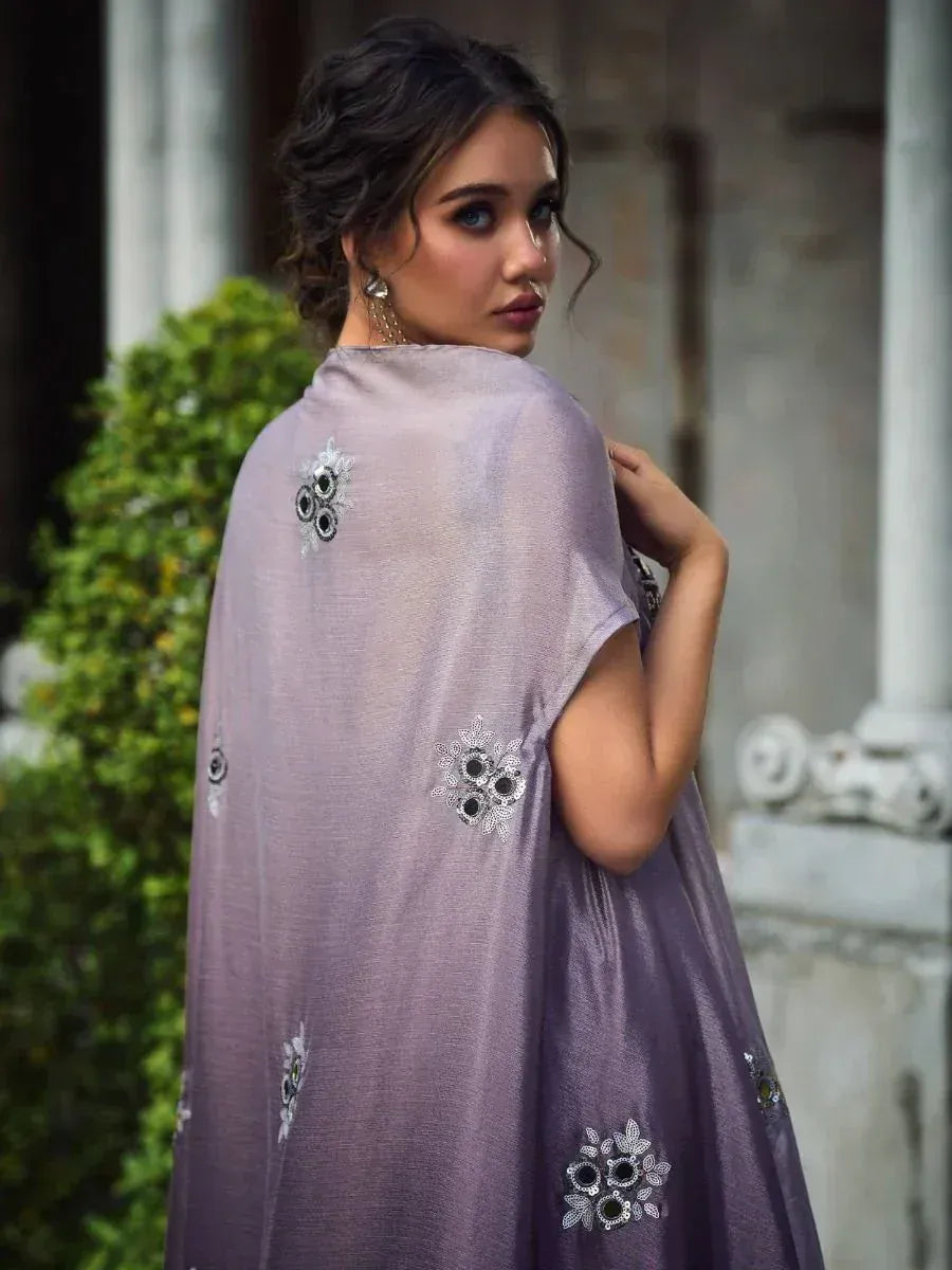 Lavender ethnic gown with floral embroidery, perfect for Indian occasions and festive wear.