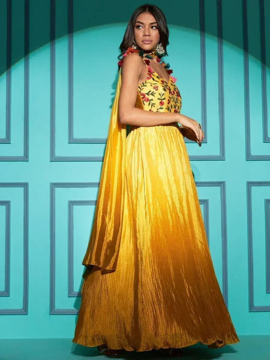 Yellow floral embroidered ethnic gown with pleated skirt, perfect for Indian occasions