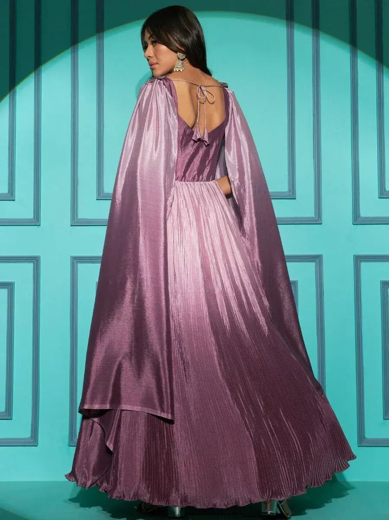 Purple pleated ethnic gown with cape back, perfect for Indian festive occasions
