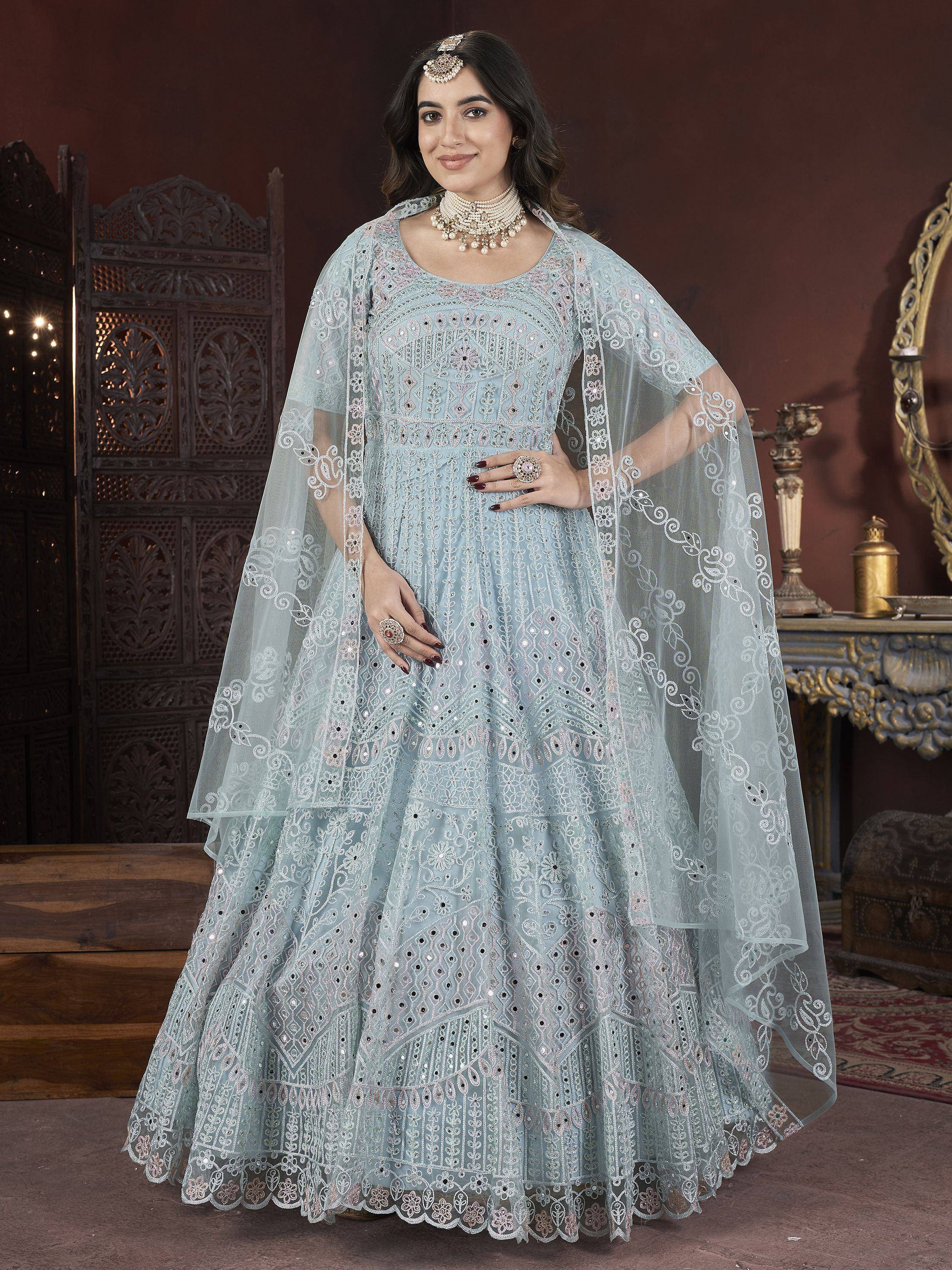 Elegant light blue embroidered lehenga choli with floral patterns and sheer dupatta for Indian ethnic wear