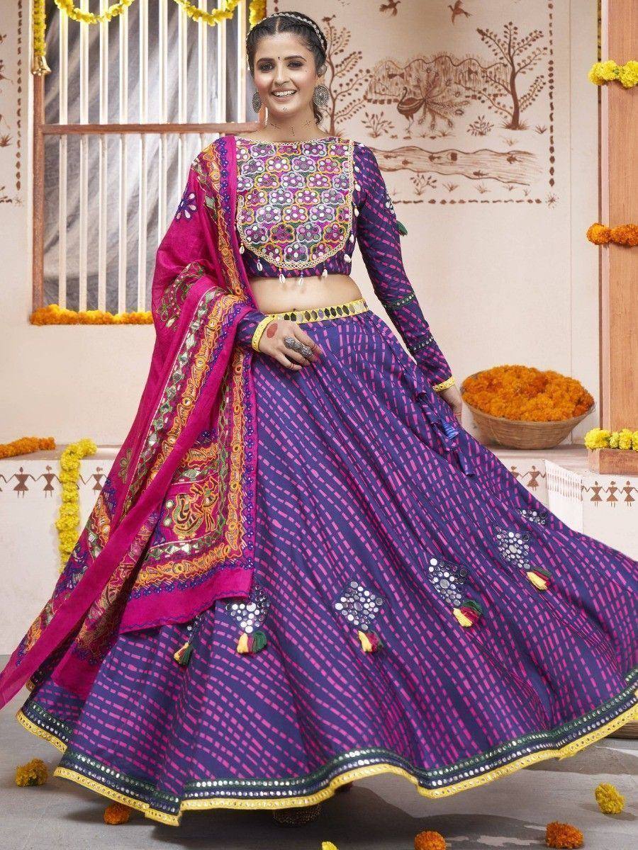 Purple and pink embroidered lehenga choli with mirror work, perfect for Indian ethnic occasions