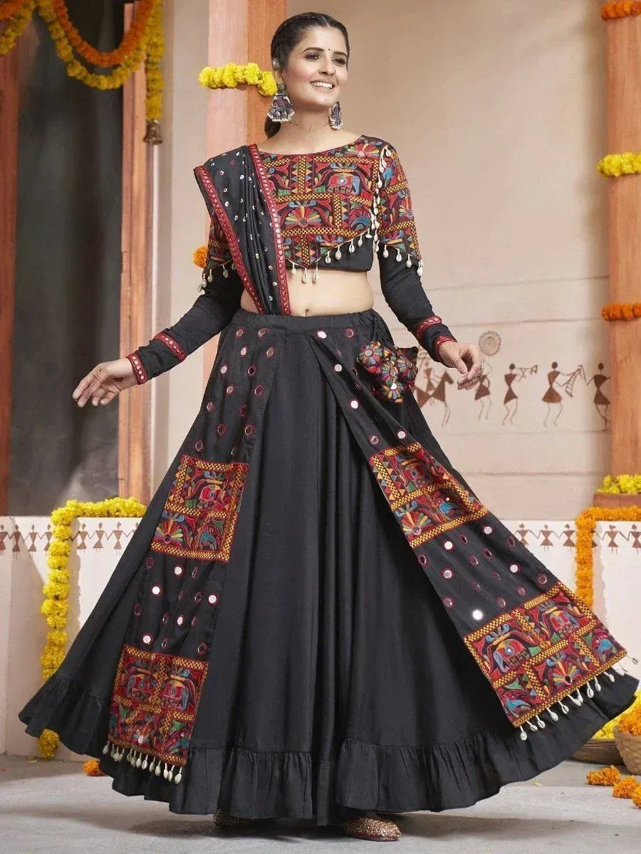Black embroidered lehenga choli with colorful mirror work, perfect for Indian ethnic occasions