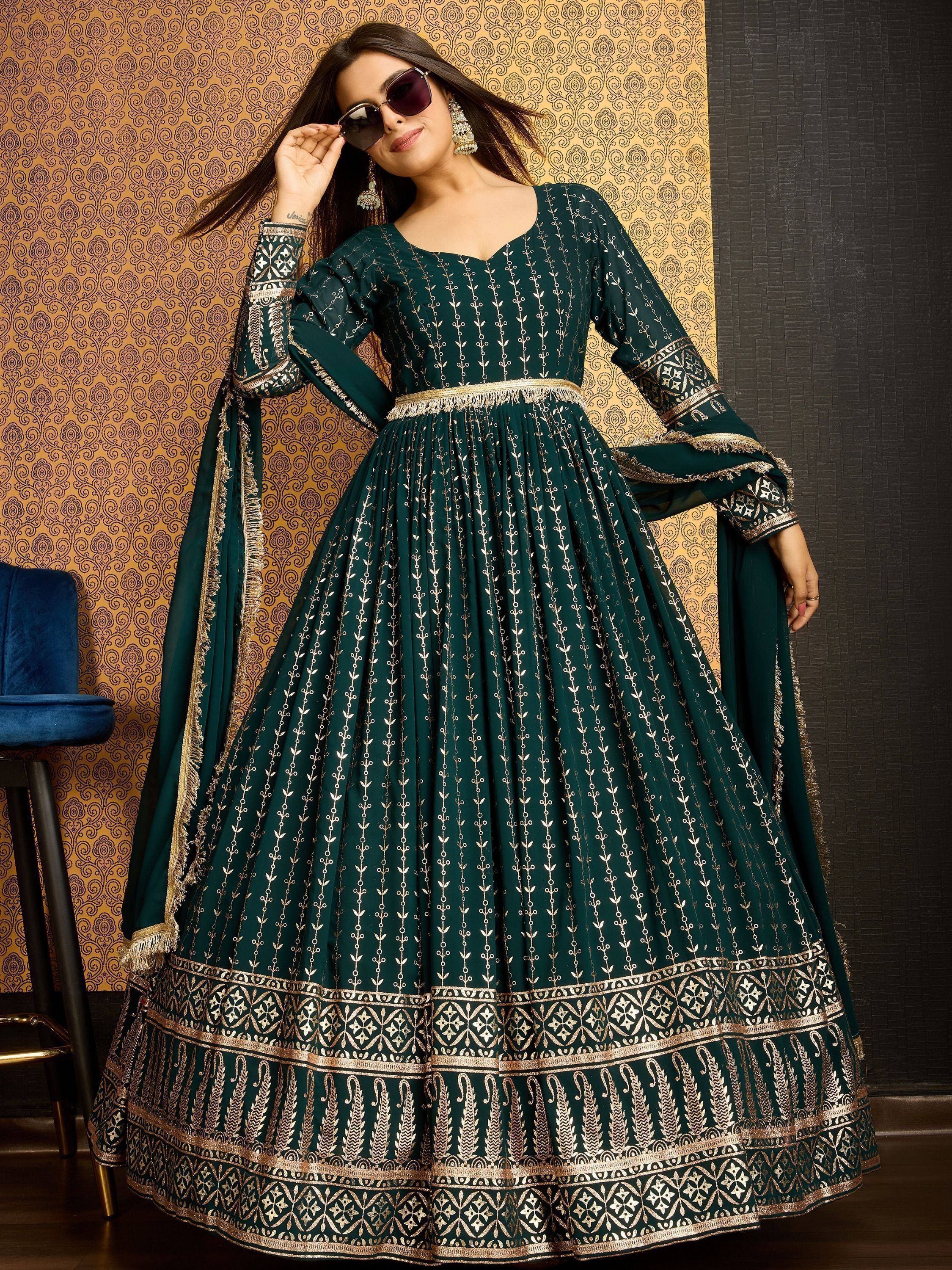 Emerald green anarkali gown with gold embroidery, perfect for Indian ethnic wear occasions.