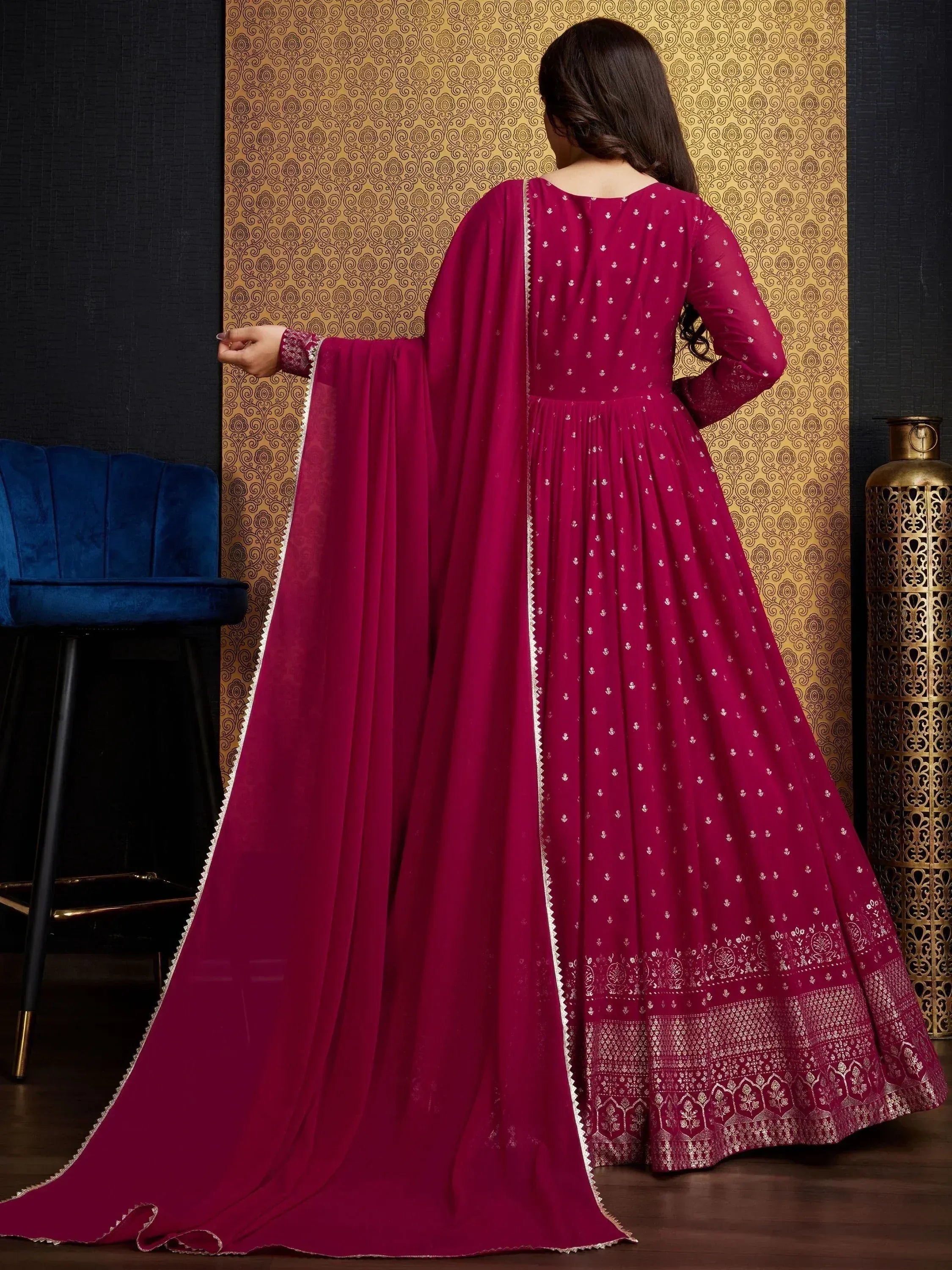 Elegant maroon ethnic gown with silver embroidery and cape, perfect for Indian festive occasions