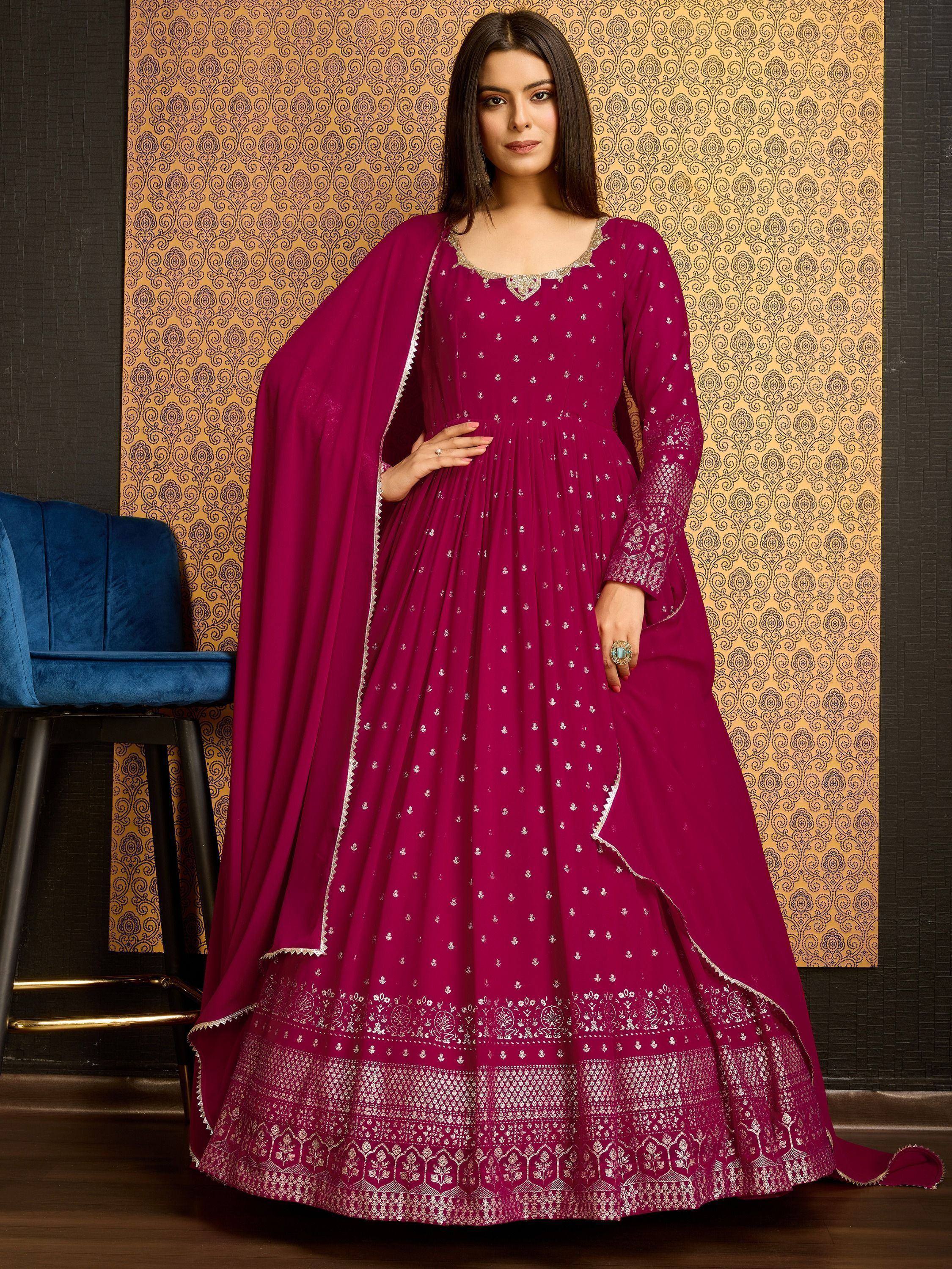 Magenta ethnic anarkali suit with silver embroidery and dupatta, perfect for Indian occasions