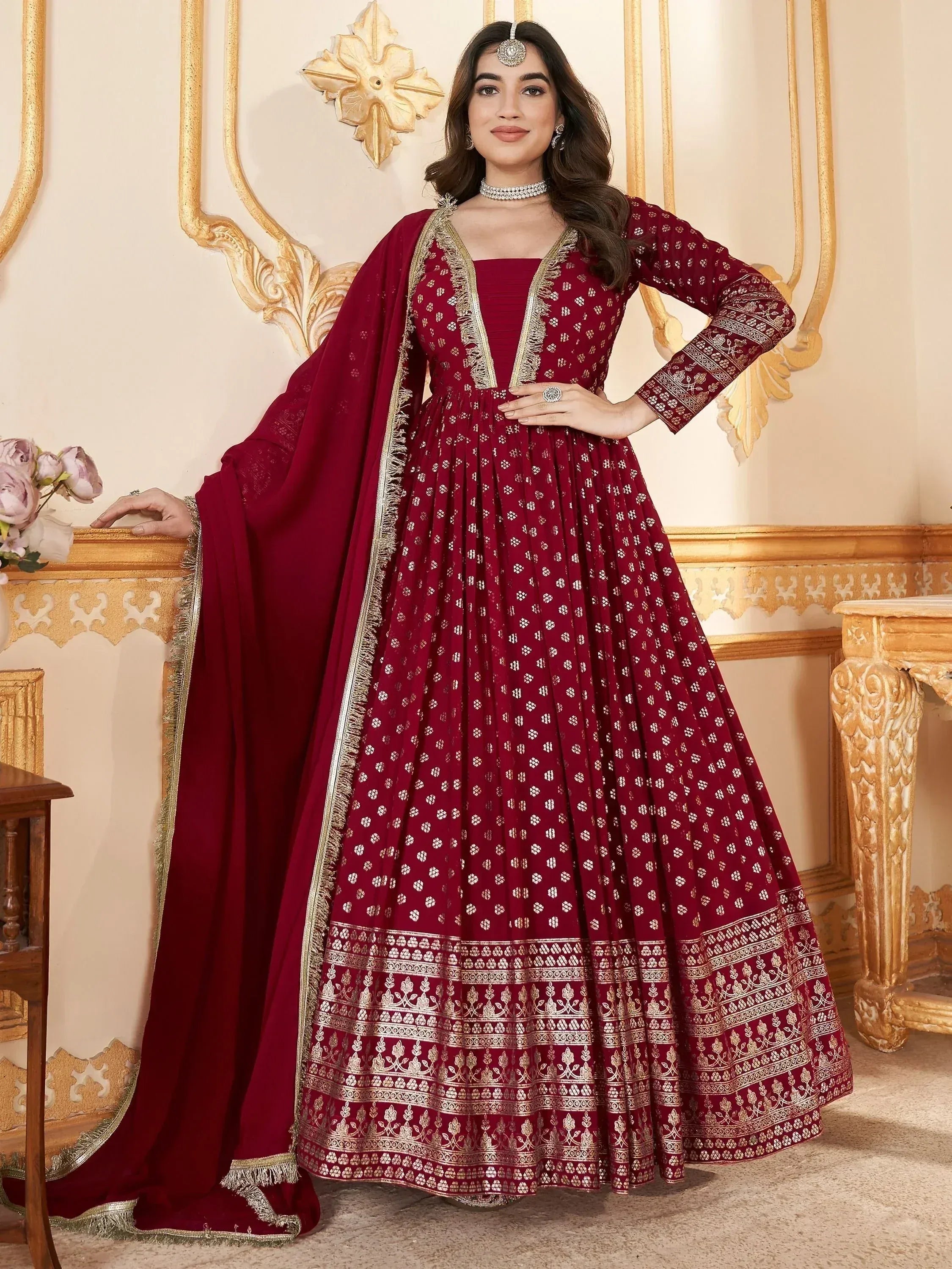 Maroon Indian anarkali suit with gold embroidery, perfect for weddings and festive occasions