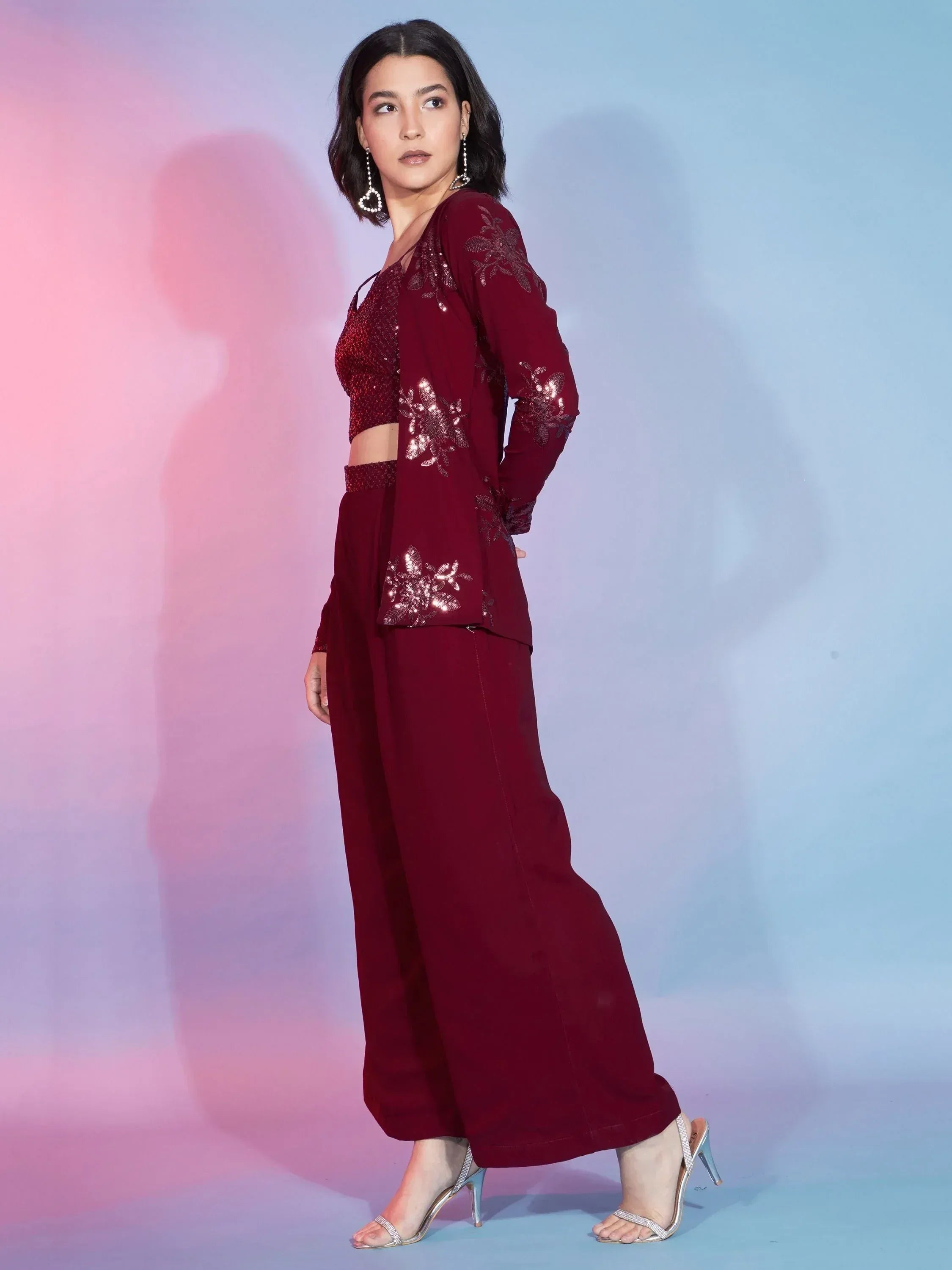 Maroon ethnic palazzo suit with sequin embroidery, perfect for festive occasions and parties.