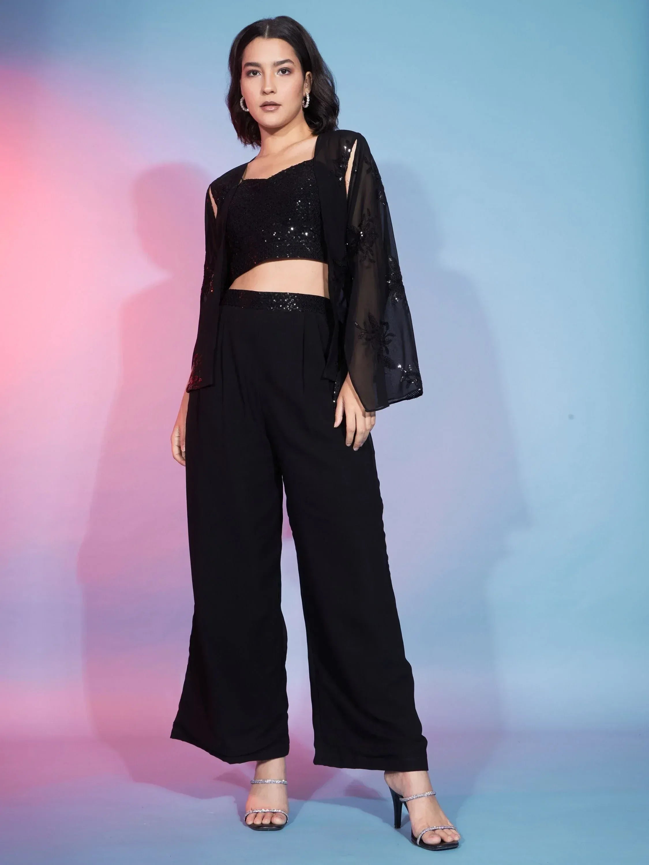 Black sequin crop top with sheer embroidered jacket and wide-leg pants, ethnic party wear outfit