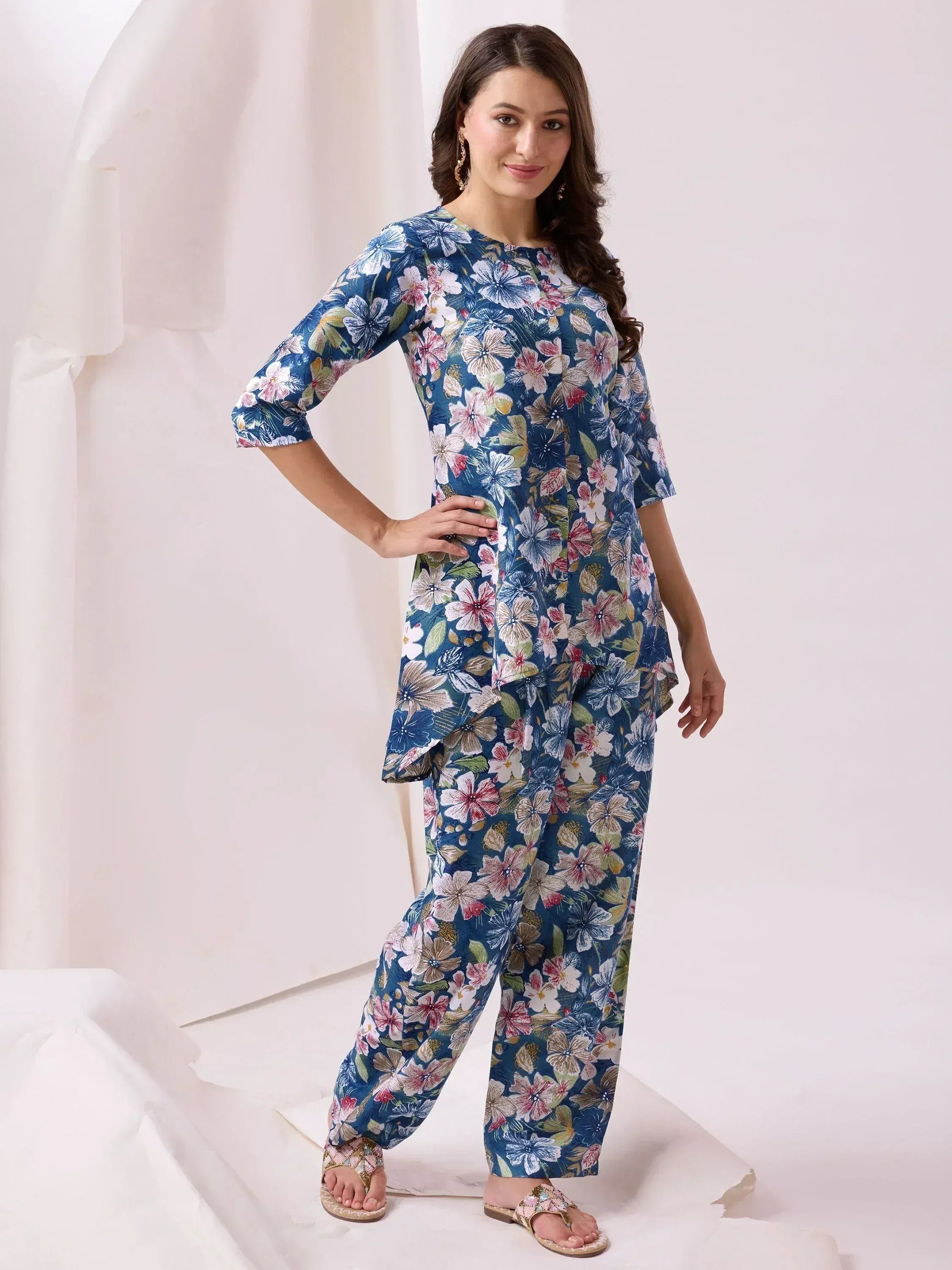 Floral print salwar kameez with asymmetrical kurta, perfect for ethnic wear and casual occasions.