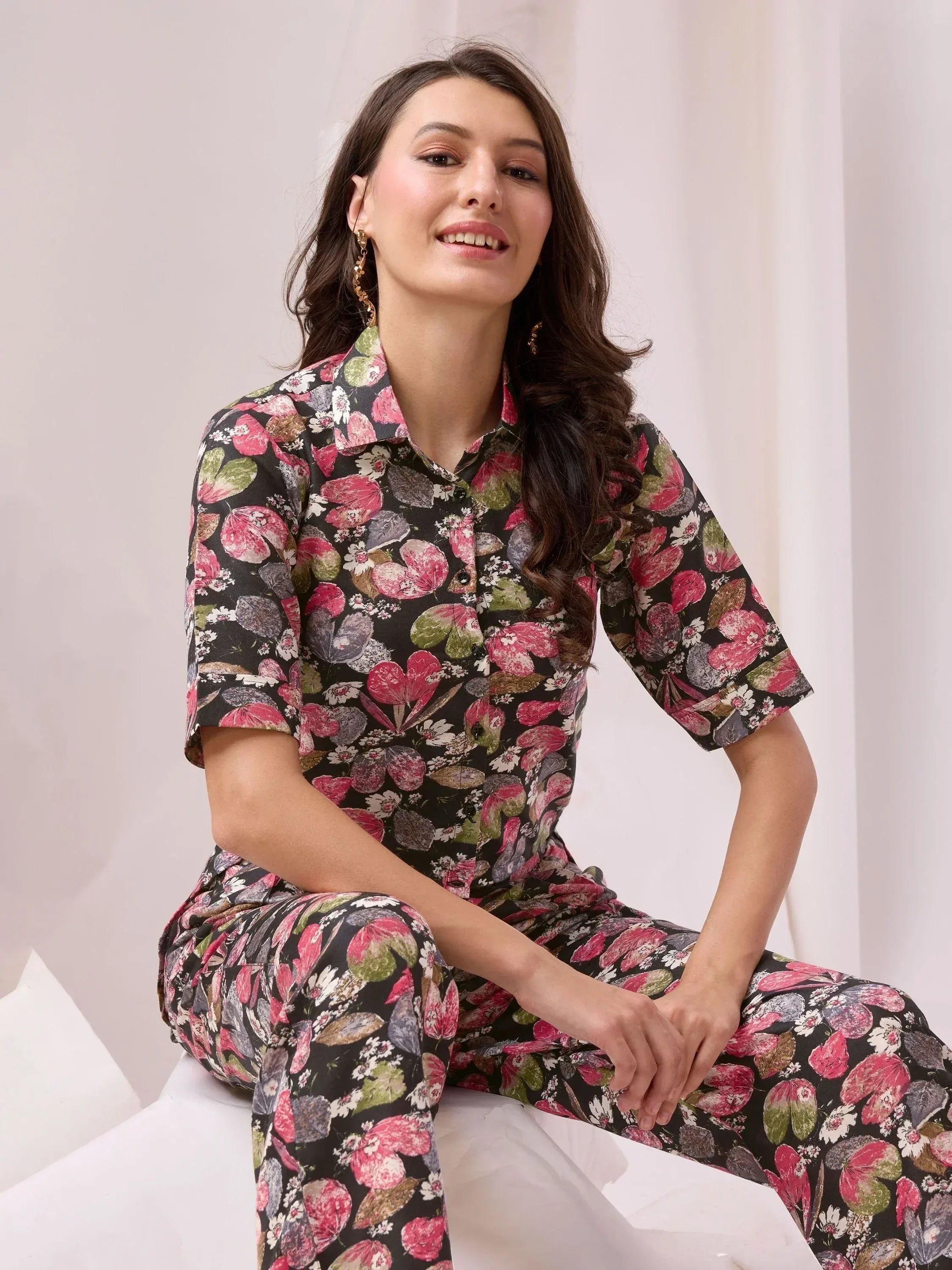 Floral print ethnic kurta set with pink and green blooms on black, stylish Indian wear for women