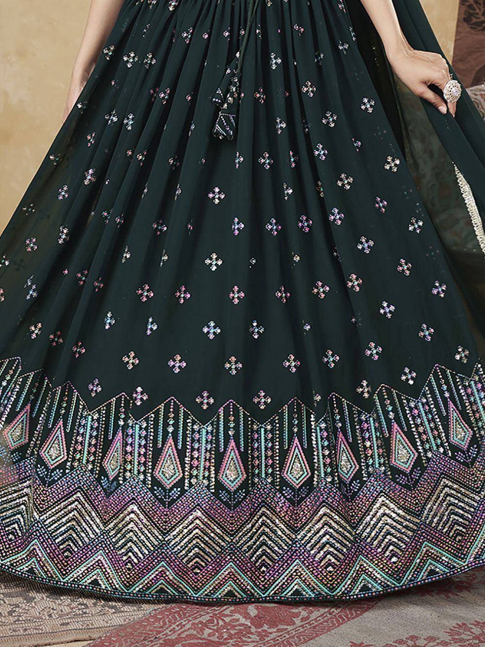 Dark green designer lehenga with colorful geometric embroidery and embellished border